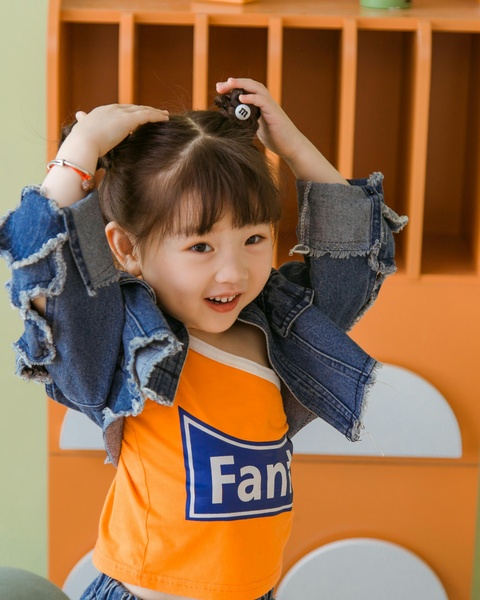 Smiling Little Girl Posing Playfully