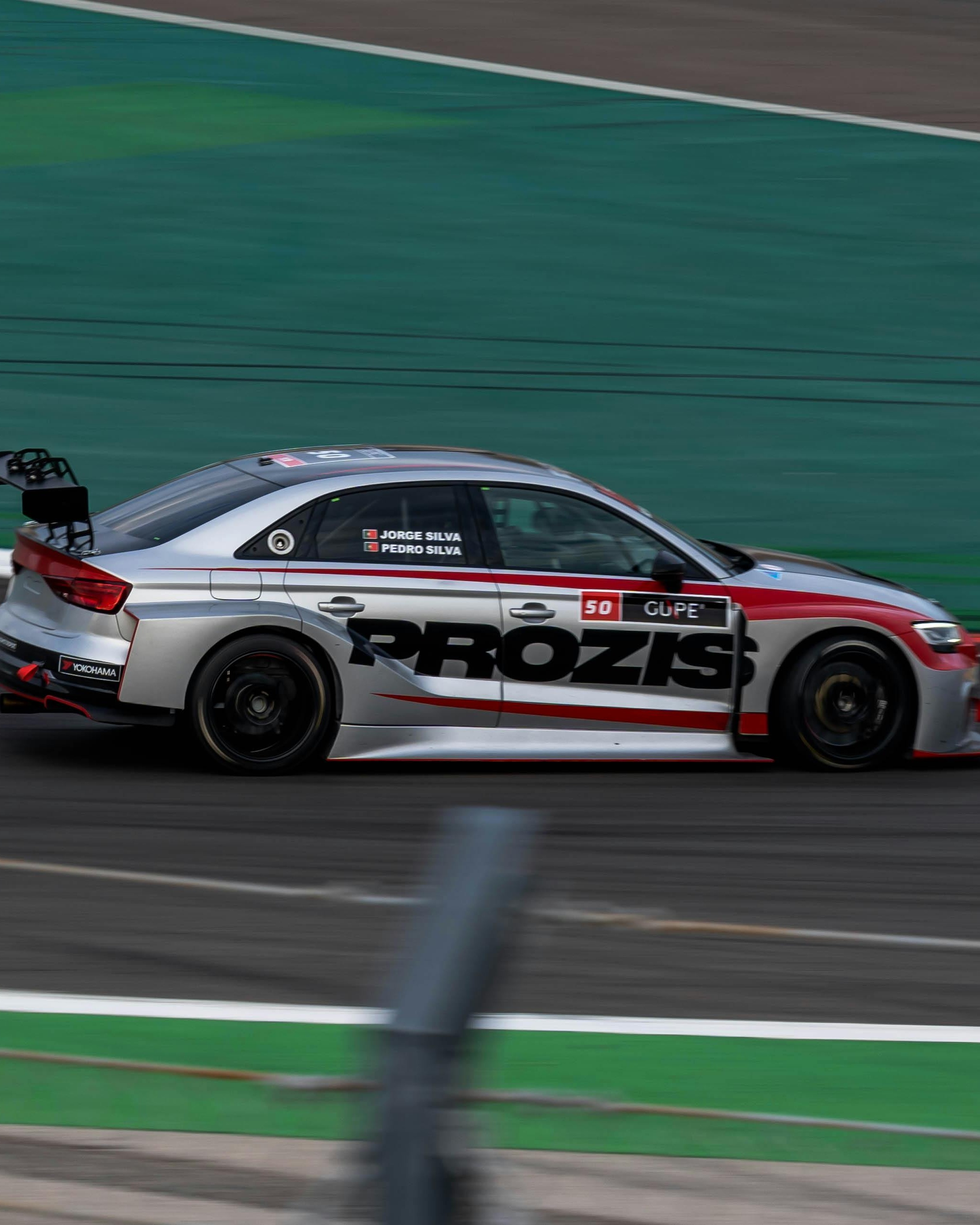 Prozis Race Car Speeding on Race Track