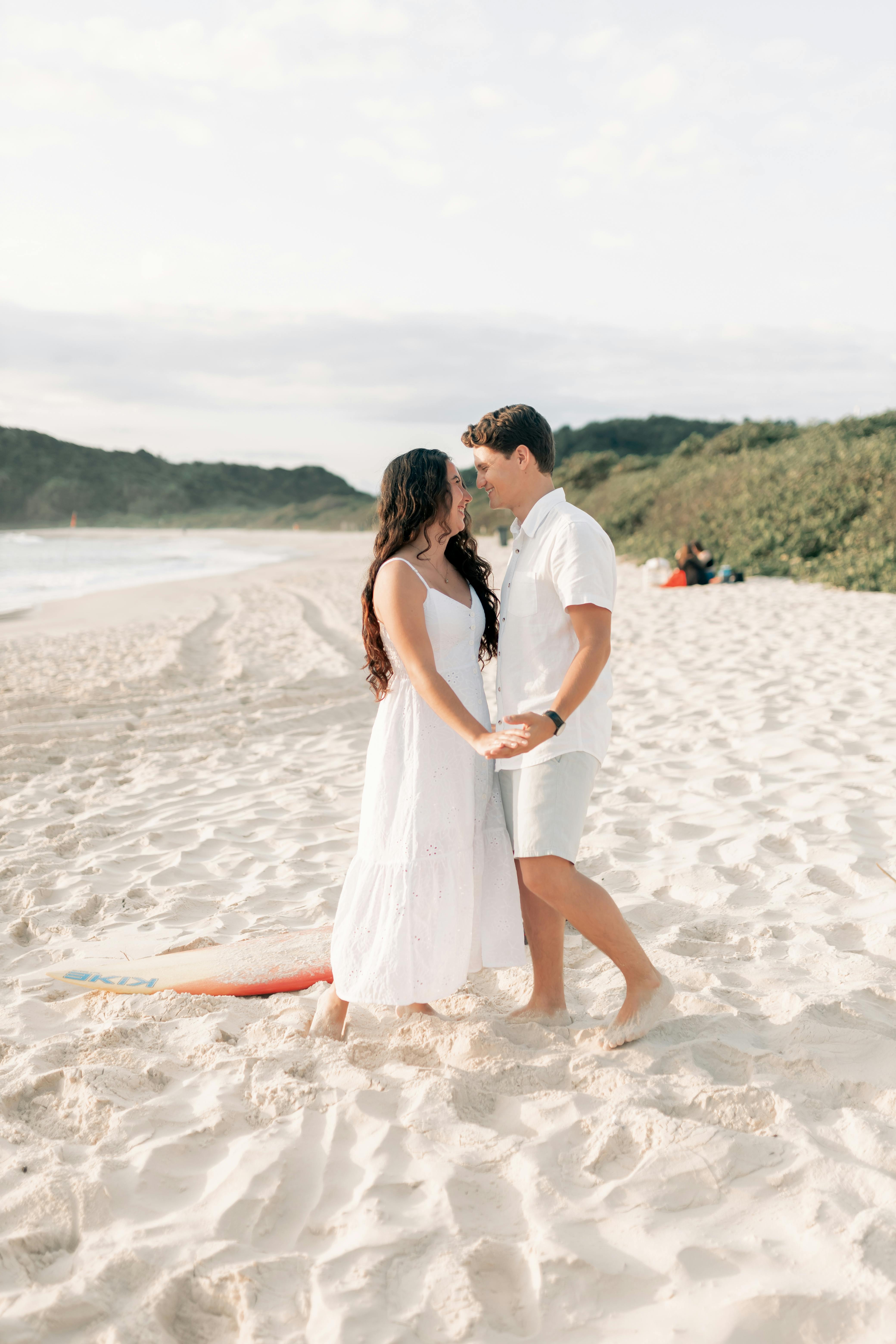 Couple Dancing on Sandy Beach