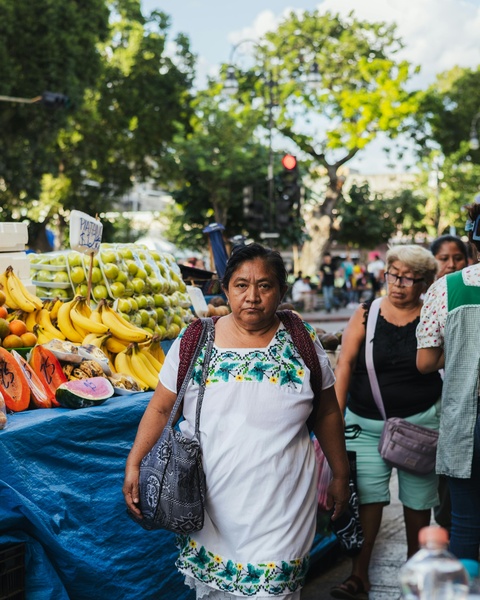 Indigenous Woman at Outdoor Street Market
