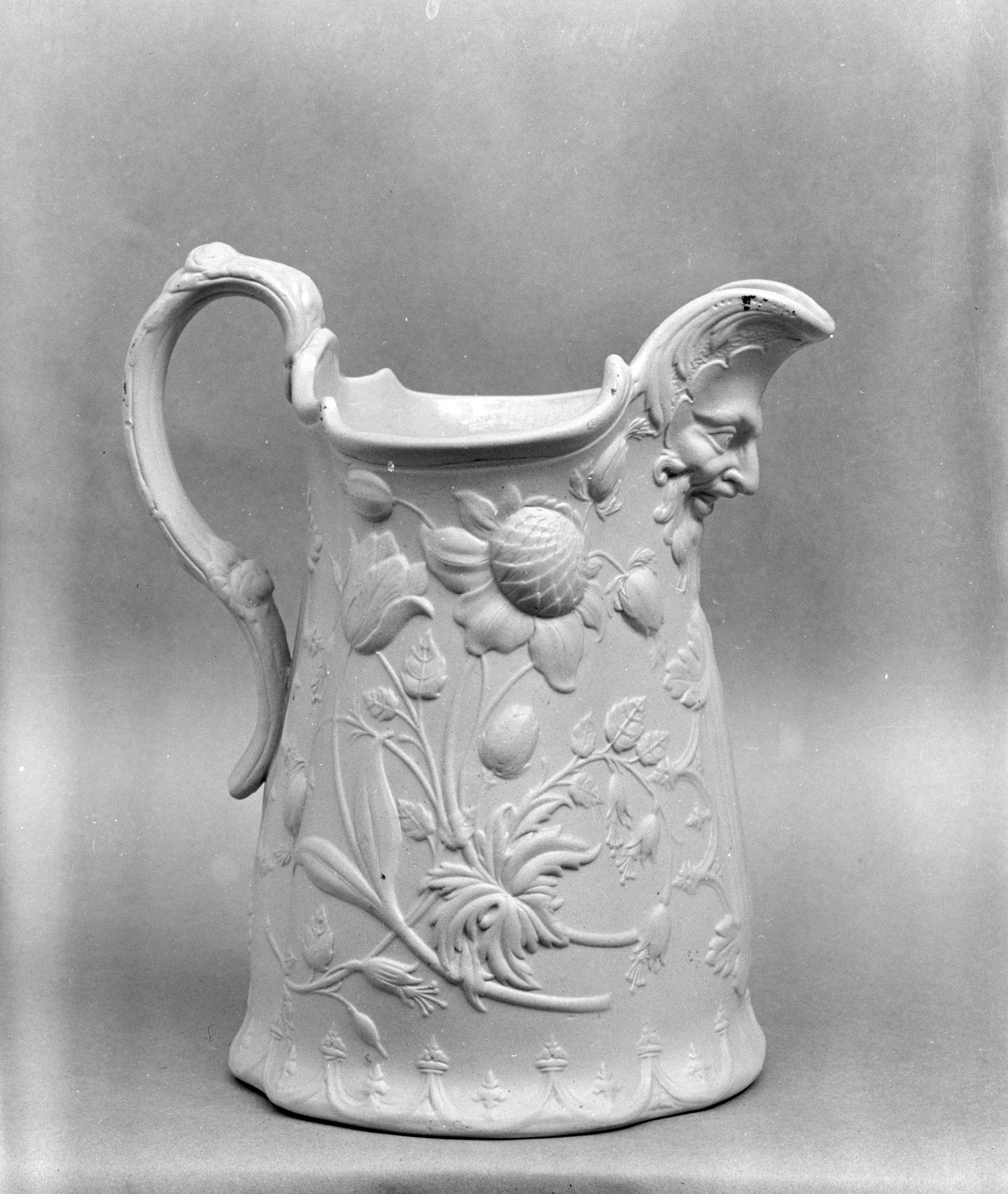 Relief Embossed Ceramic Pitcher