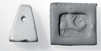 Two Ancient Stone Archaeological Artifacts