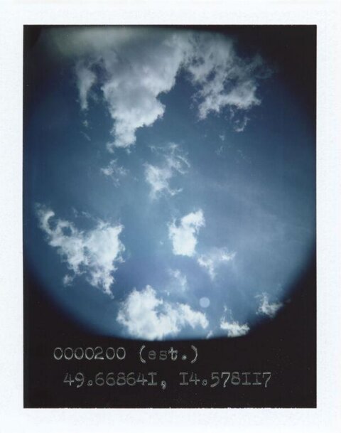 Polaroid Shot of Blue Sky with Clouds
