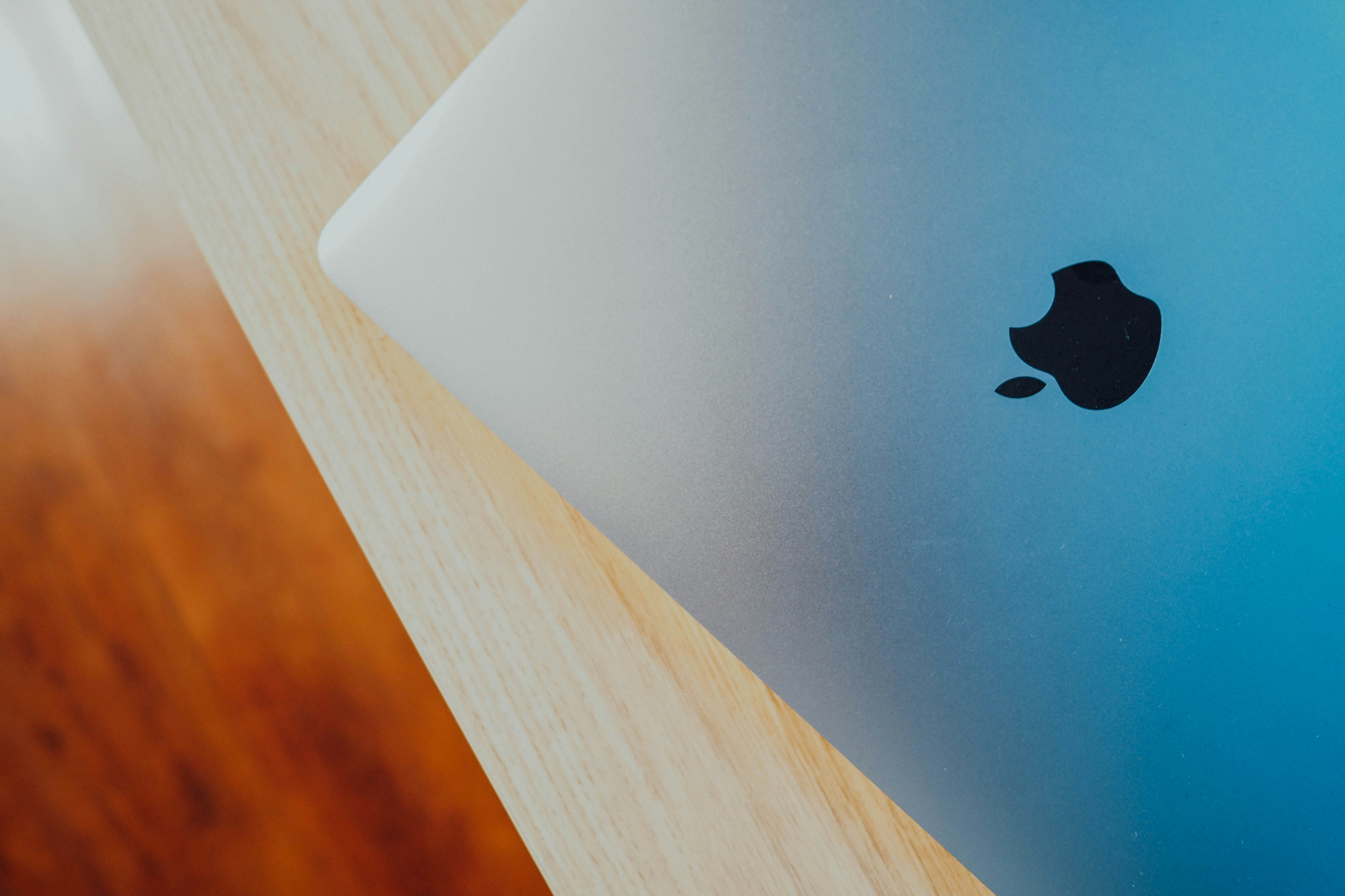 Apple Laptop Back on Wooden Table