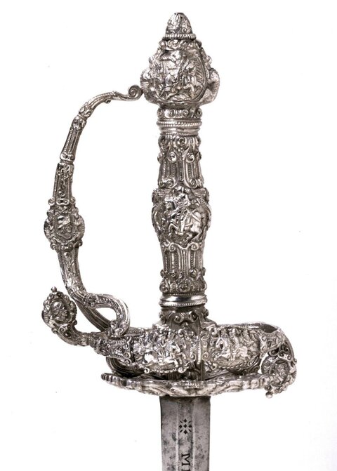 Ornate Carved Silver Sword Hilt