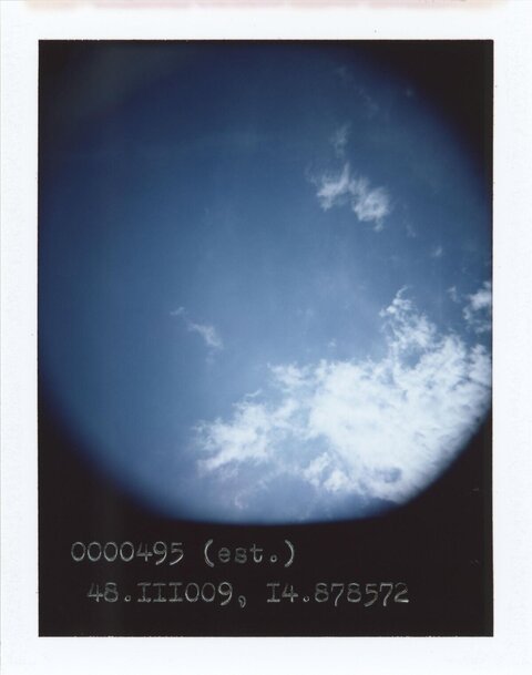 Polaroid Shot of Blue Sky with Clouds