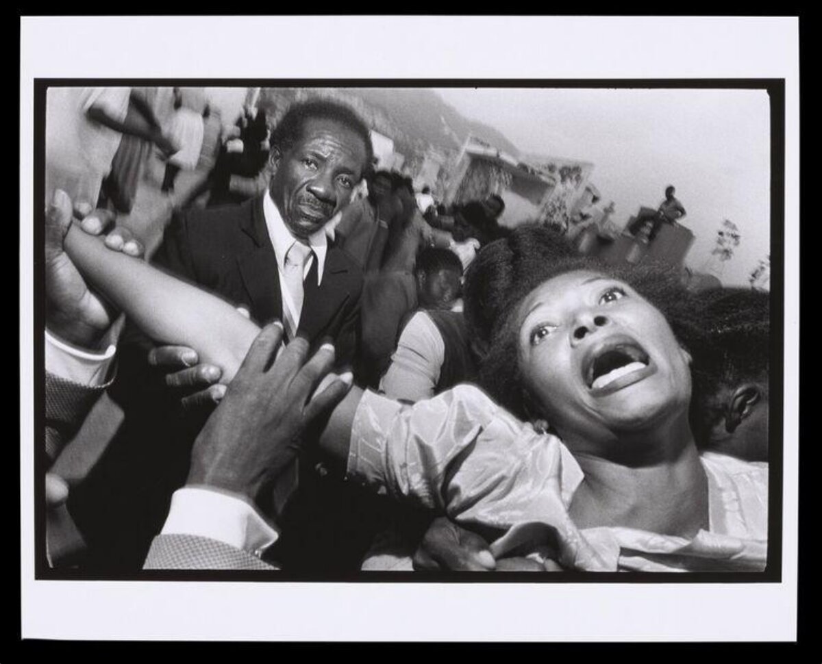Emotionally Distressed Woman in Crowd