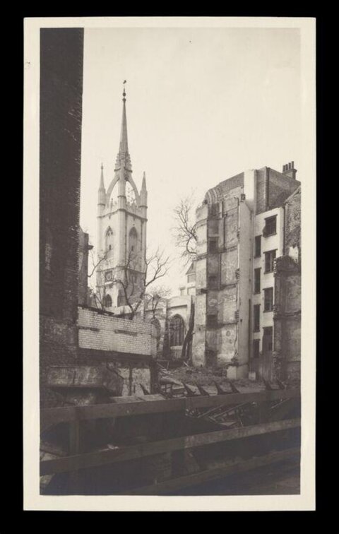 Damaged Church Spire Among Ruins