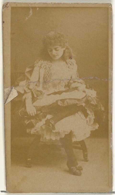 Vintage Photo of Seated Young Woman