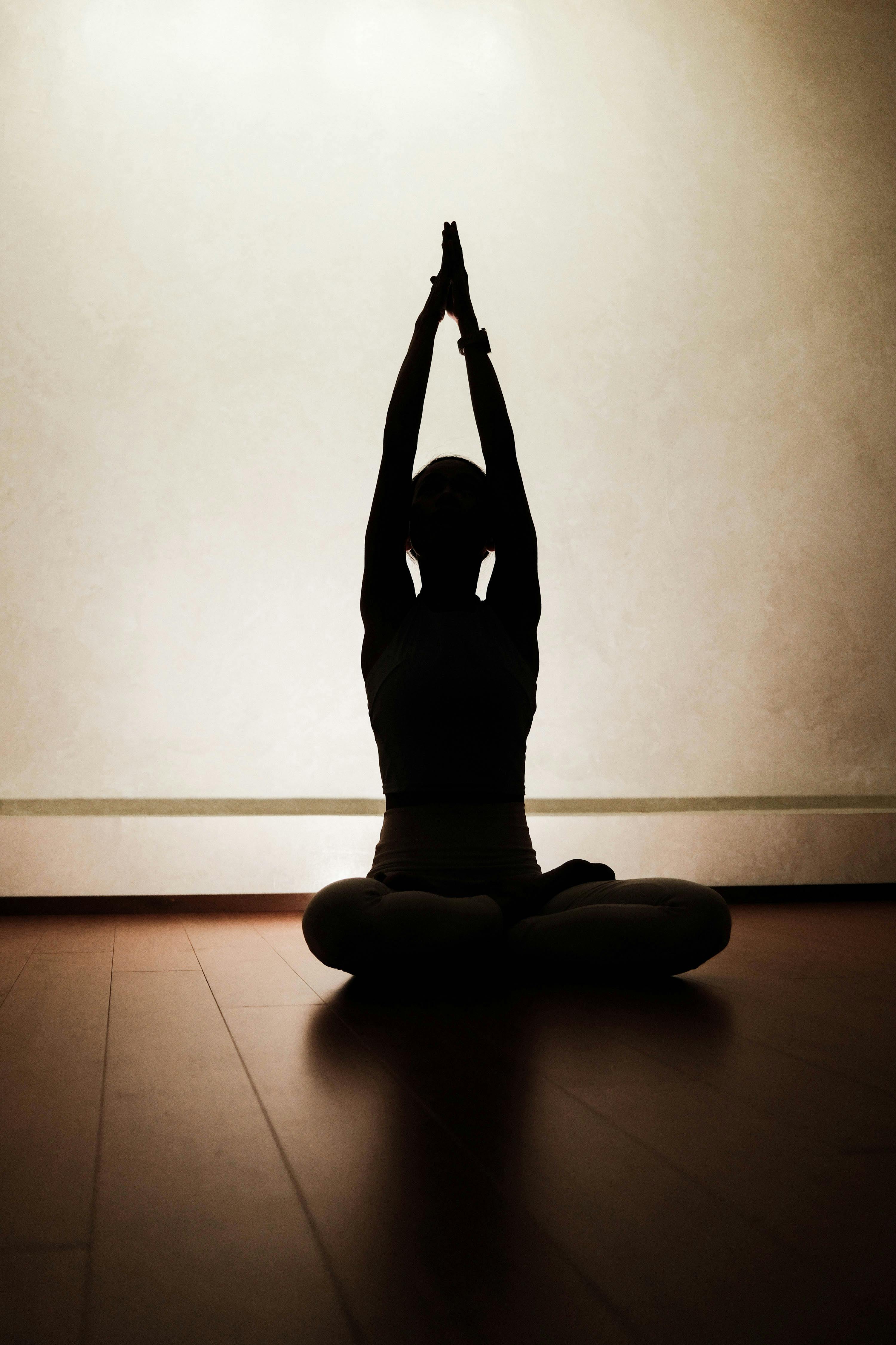 Silhouette of Person Practicing Yoga — Fitness