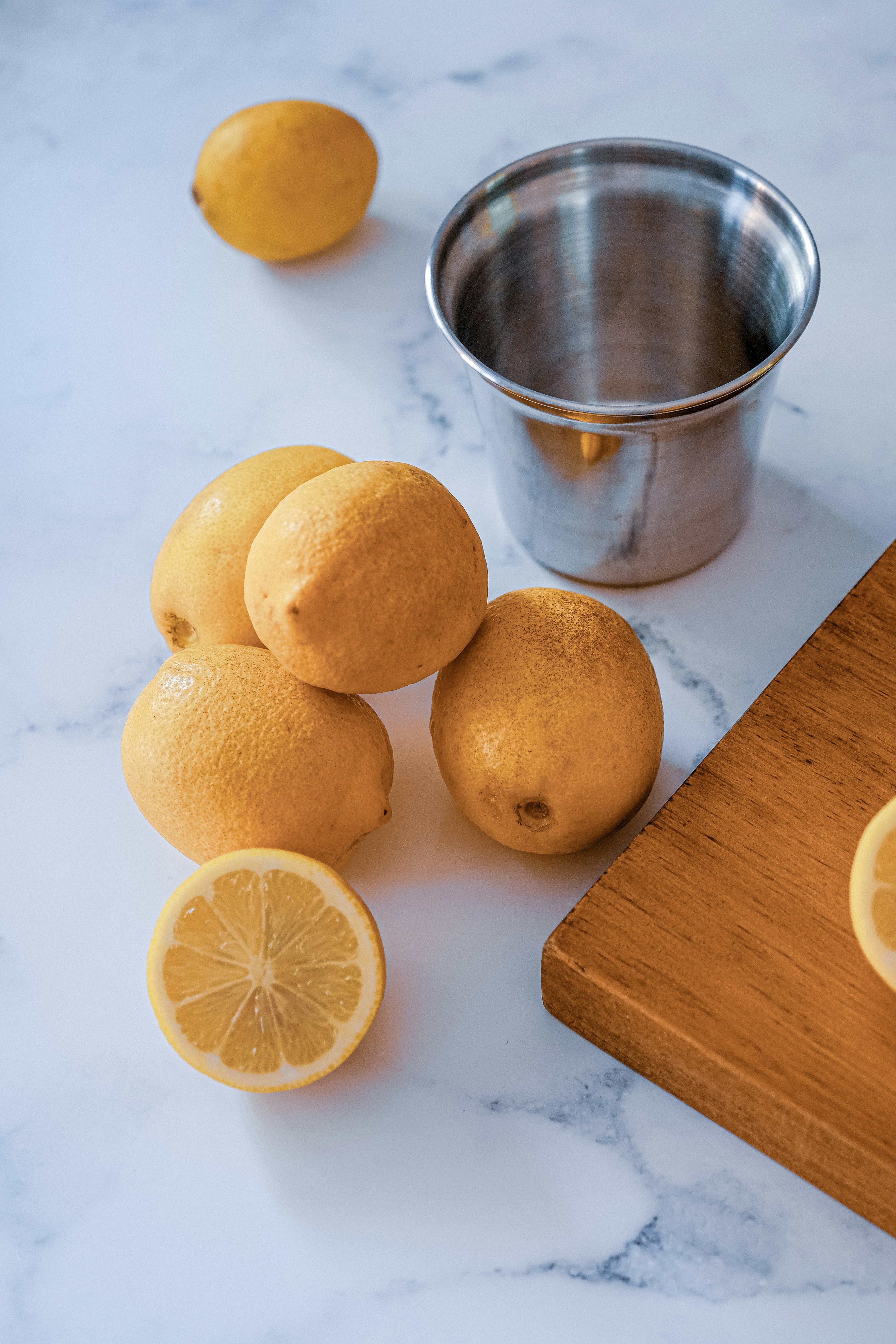 Fresh Lemons on Marble Countertop
