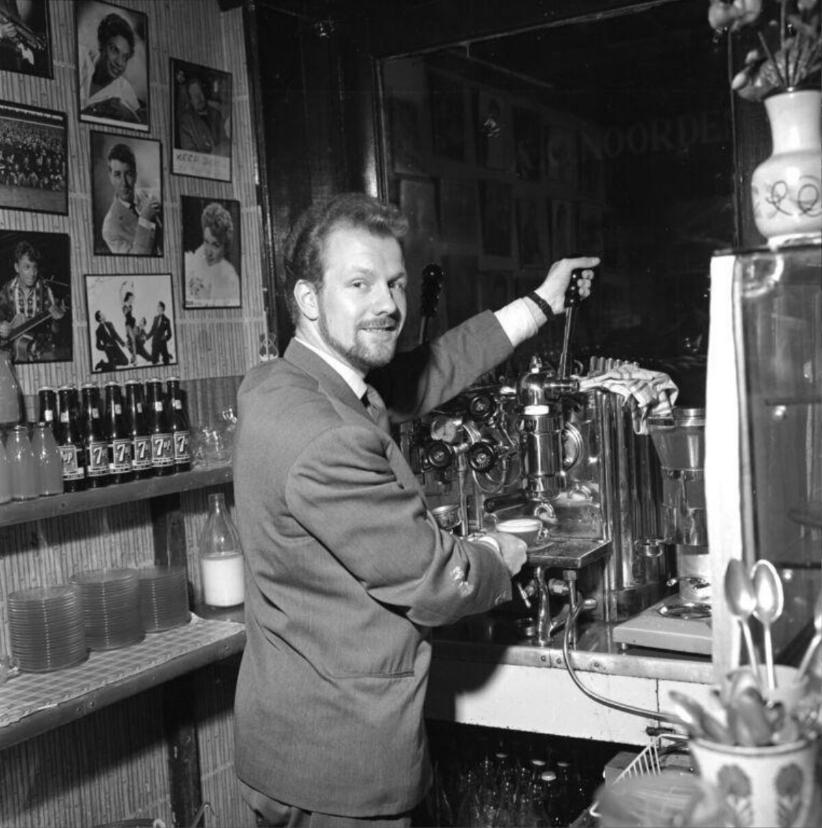 Barman Operating Vintage Espresso Machine
