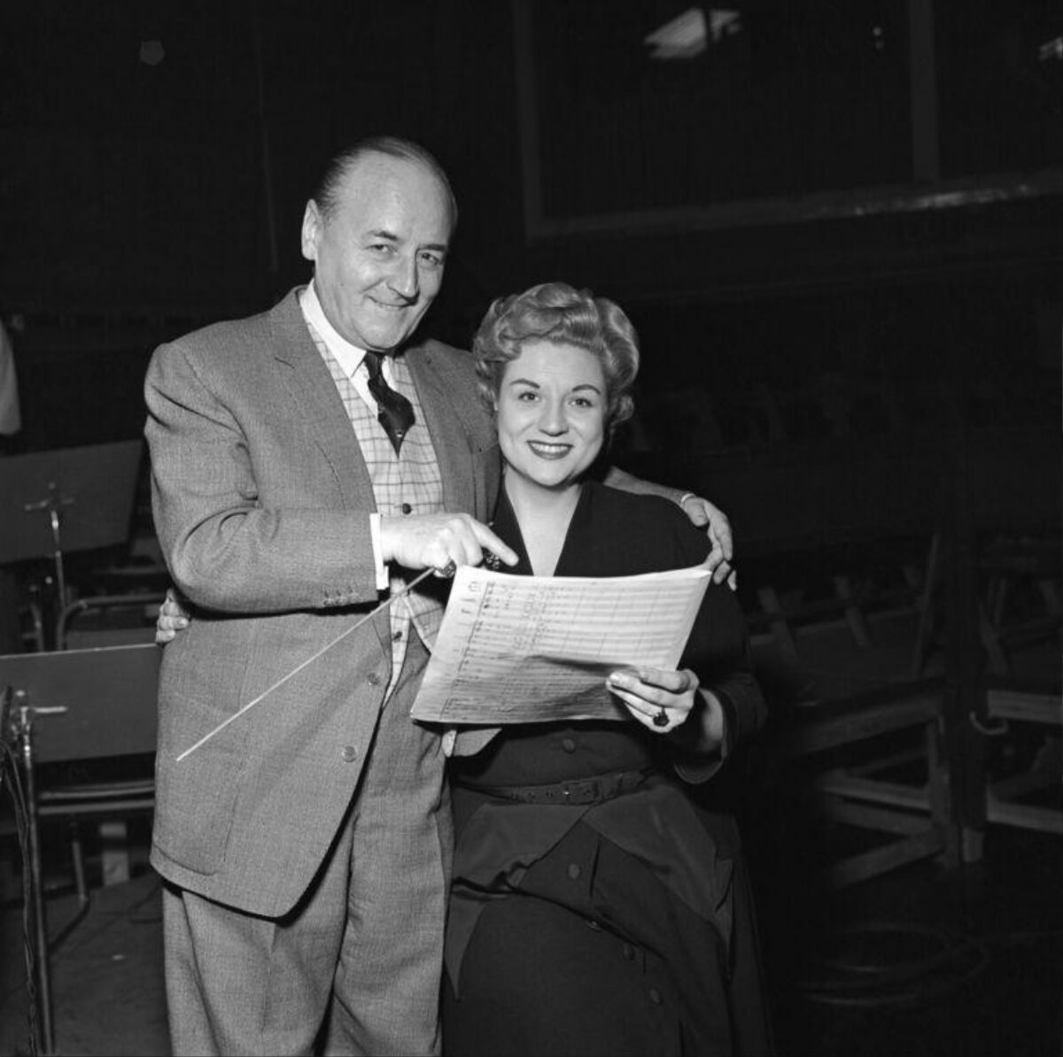 Conductor and Singer with Orchestral Score