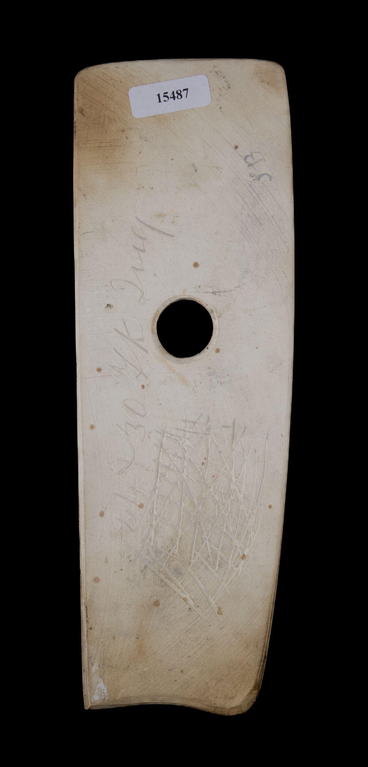 Back of Perforated Stone Axe Artifact