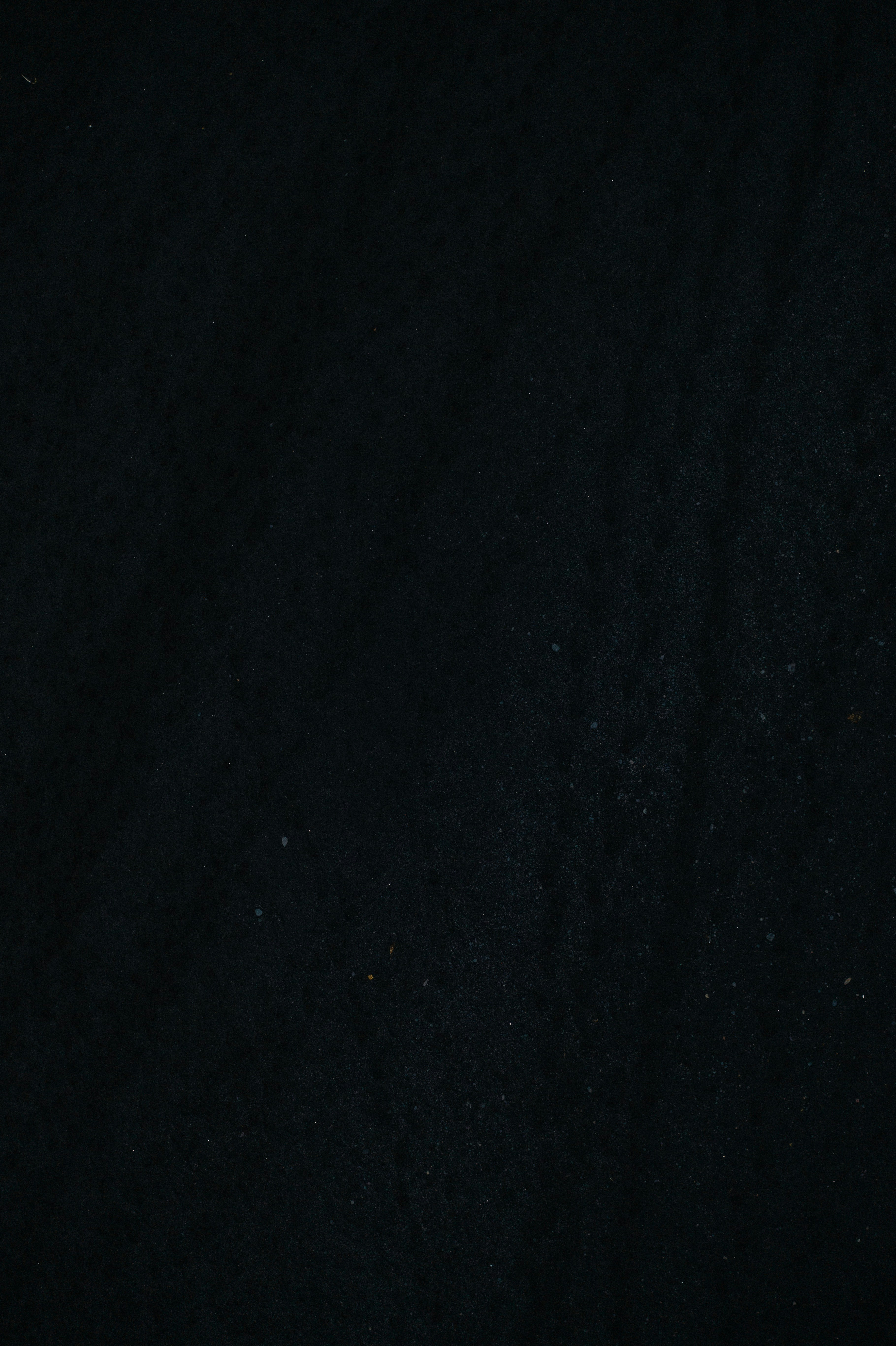 Dark Speckled Black Textured Background