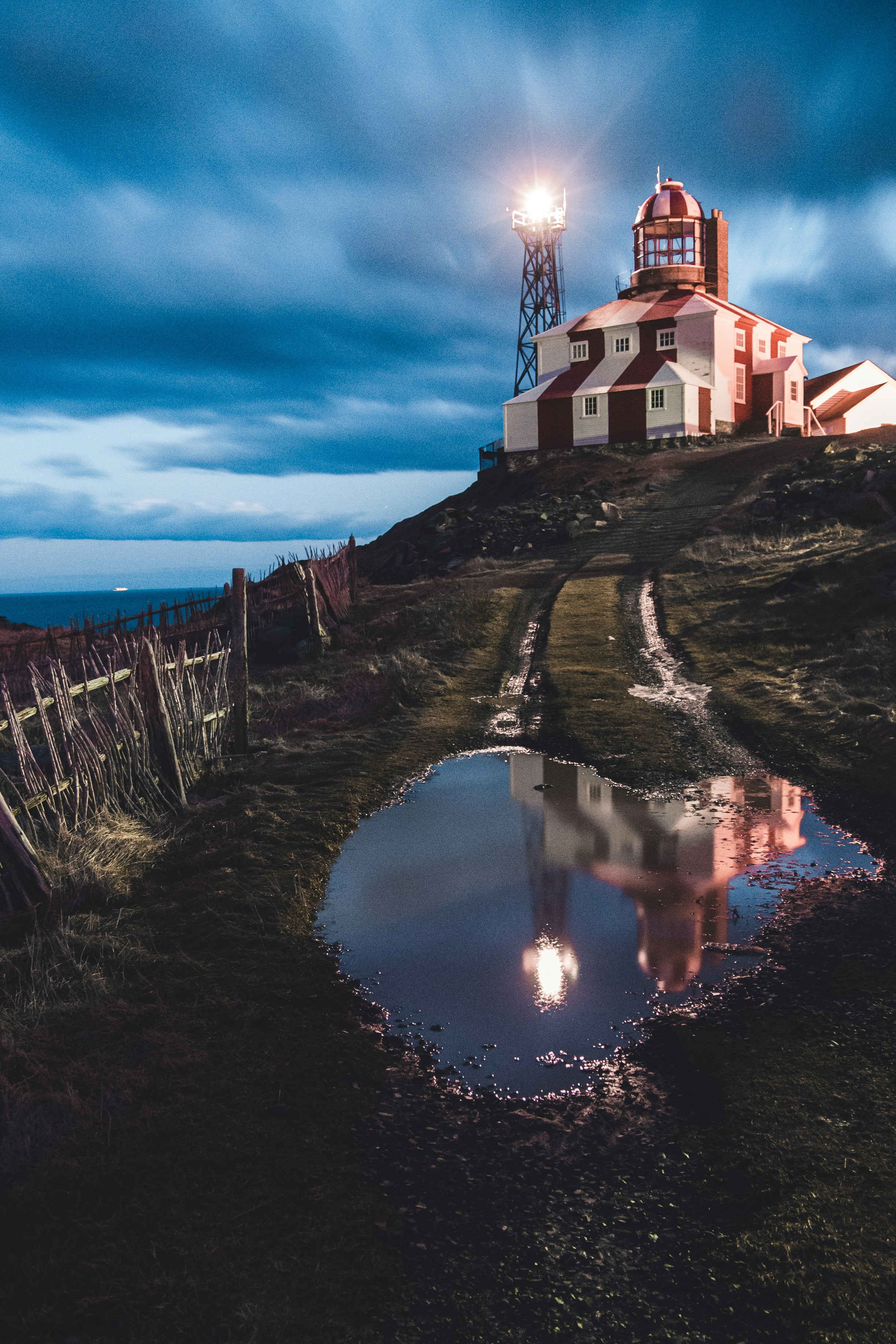 Coastal Lighthouse Reflection at Dusk