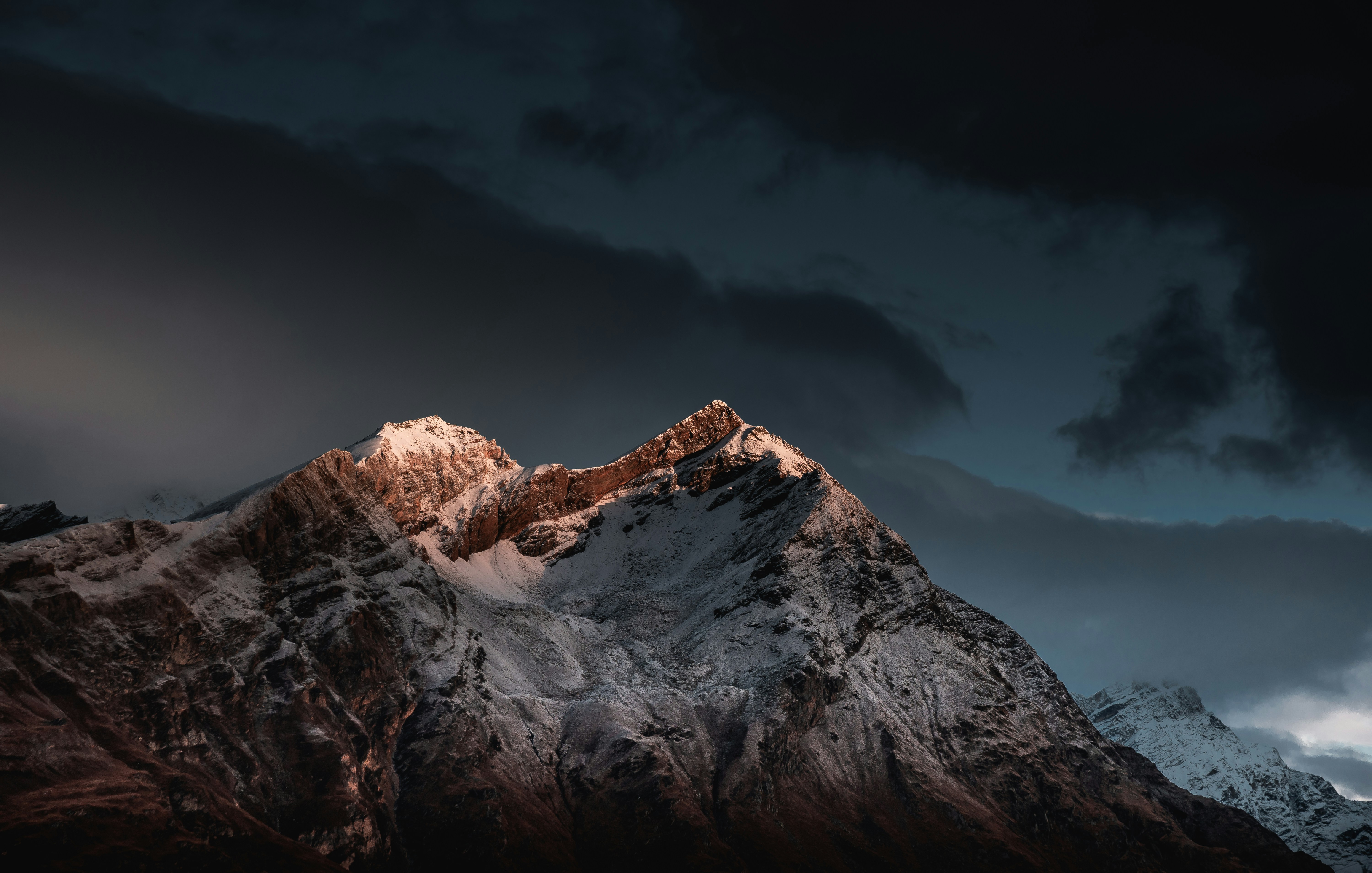 Sunlit Snowy Mountain Peak