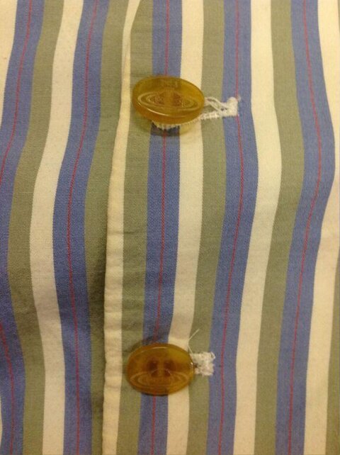 Close-up of Striped Shirt Buttons