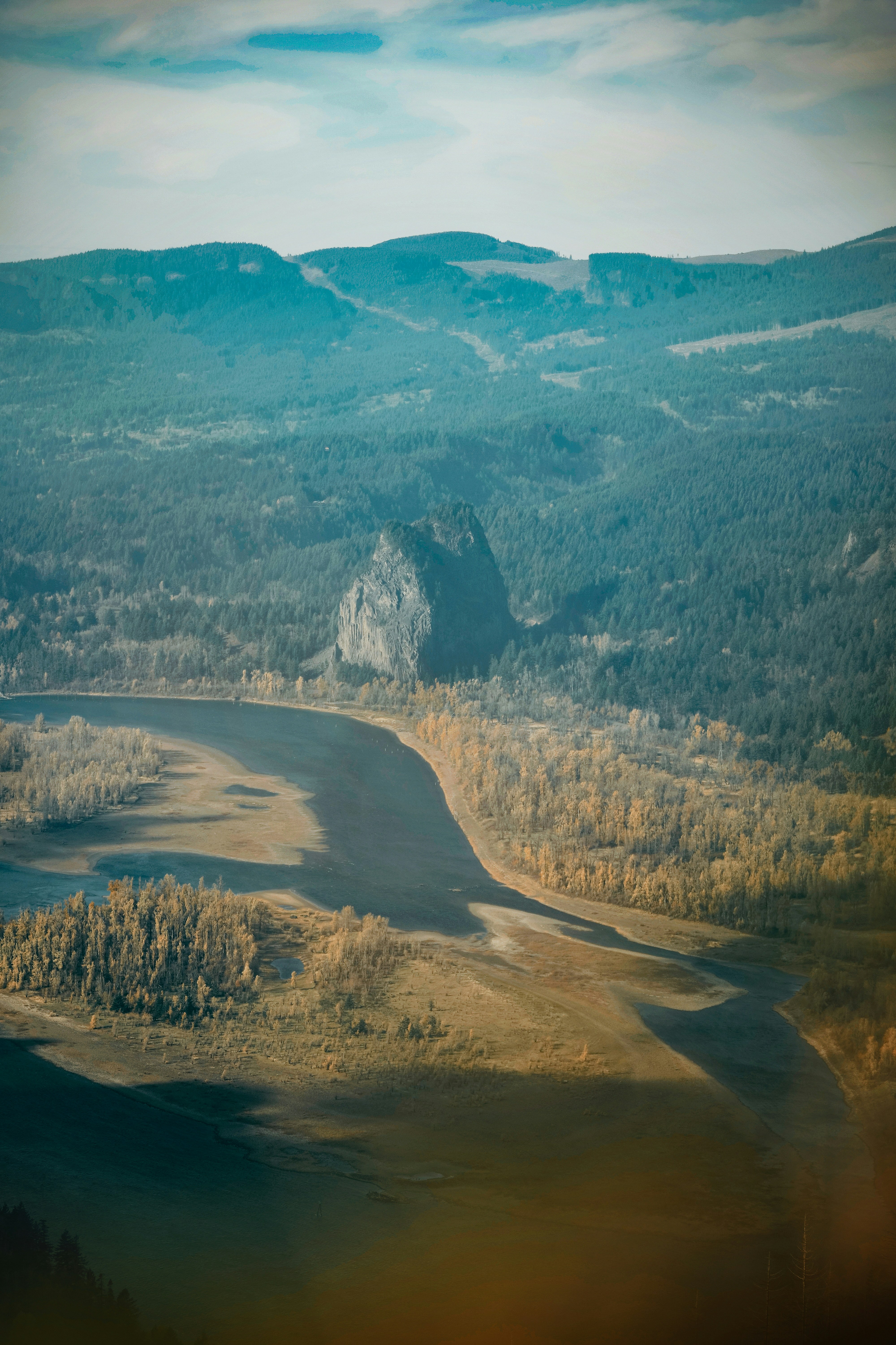 Lone Rock in Mountain River Valley