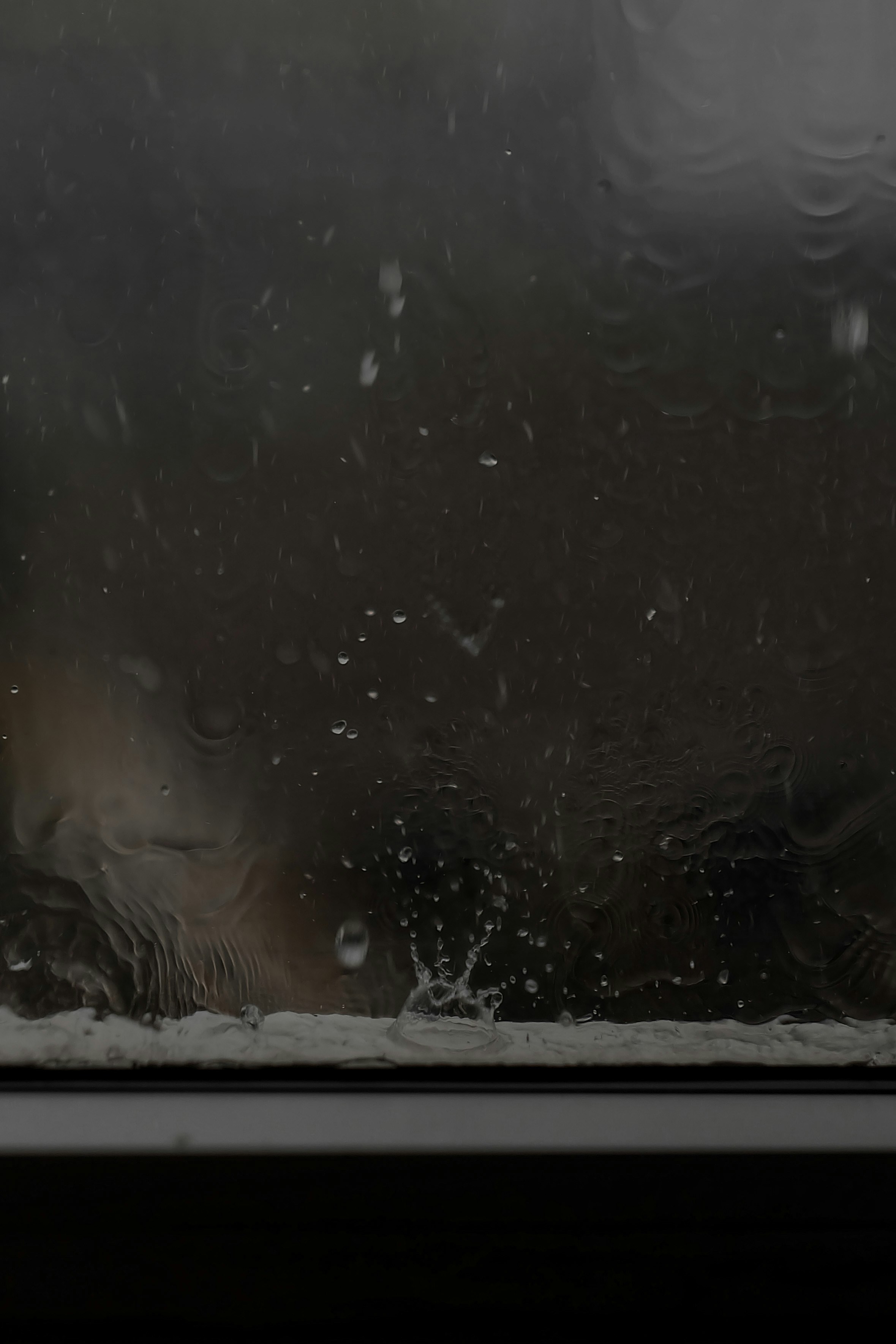 Raindrops on Glass Window