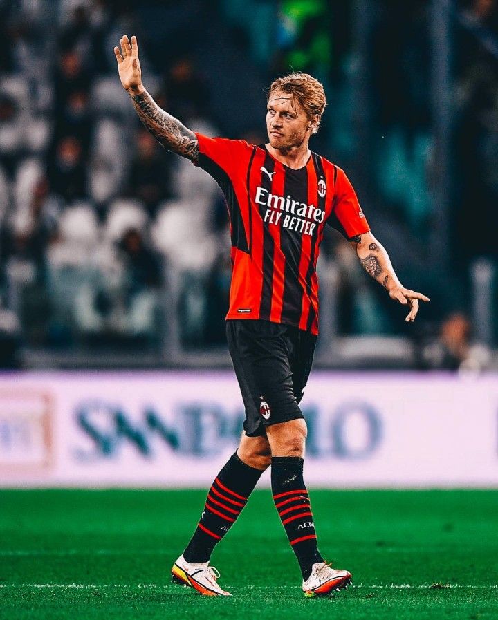 AC Milan Football Player Waving on Pitch