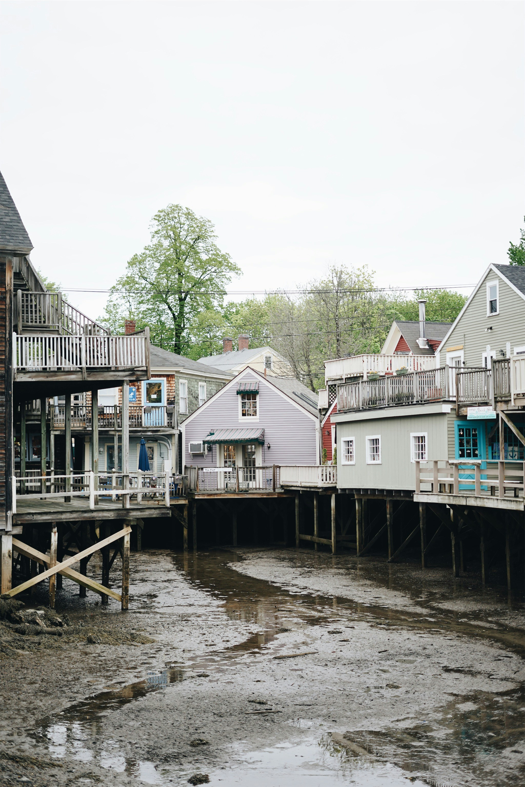Coastal Stilt Houses at Low Tide