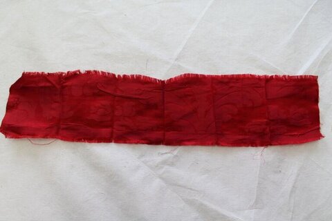 Red Fabric Strip on White Background