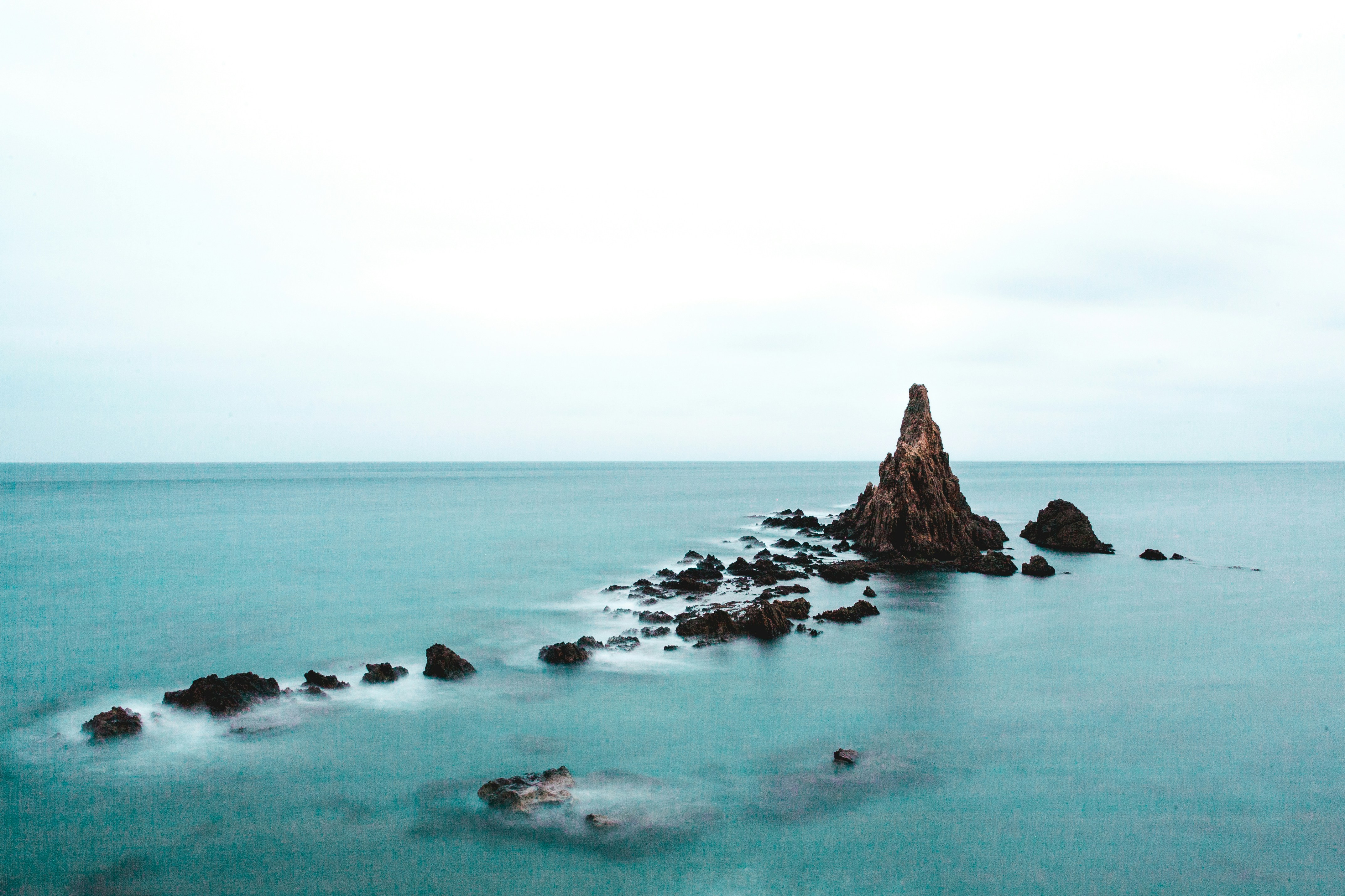 Calm Blue Sea with Offshore Rock Stacks