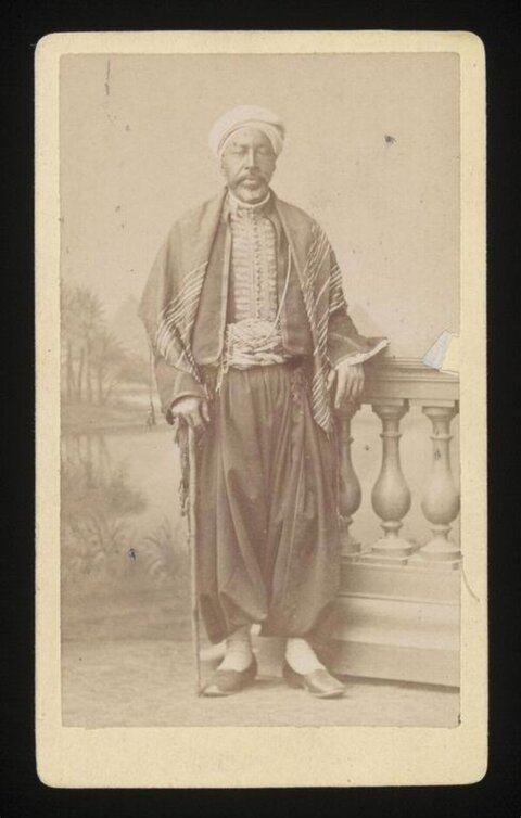 Studio Portrait of Man in Traditional Dress