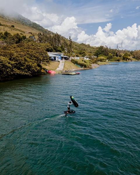 Wing Foiling on a Mountain Lake