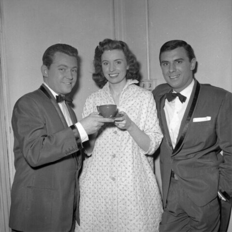 Three People Posing With Coffee Cup