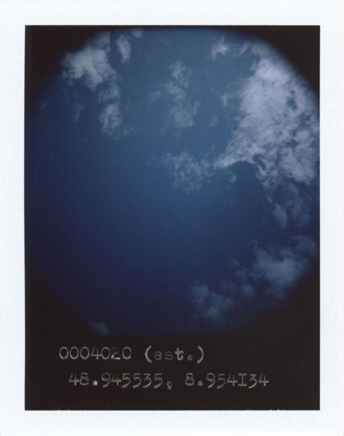 Cloudy Blue Sky With Coordinates