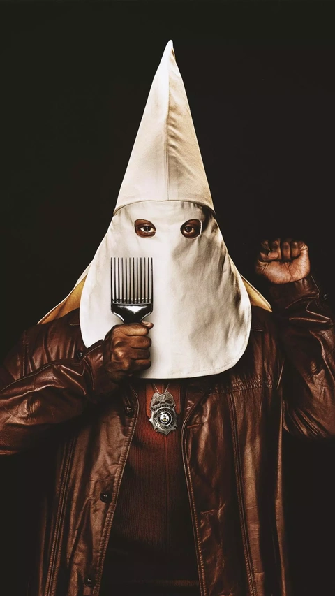 Provocative Portrait of Black Man in KKK Hood