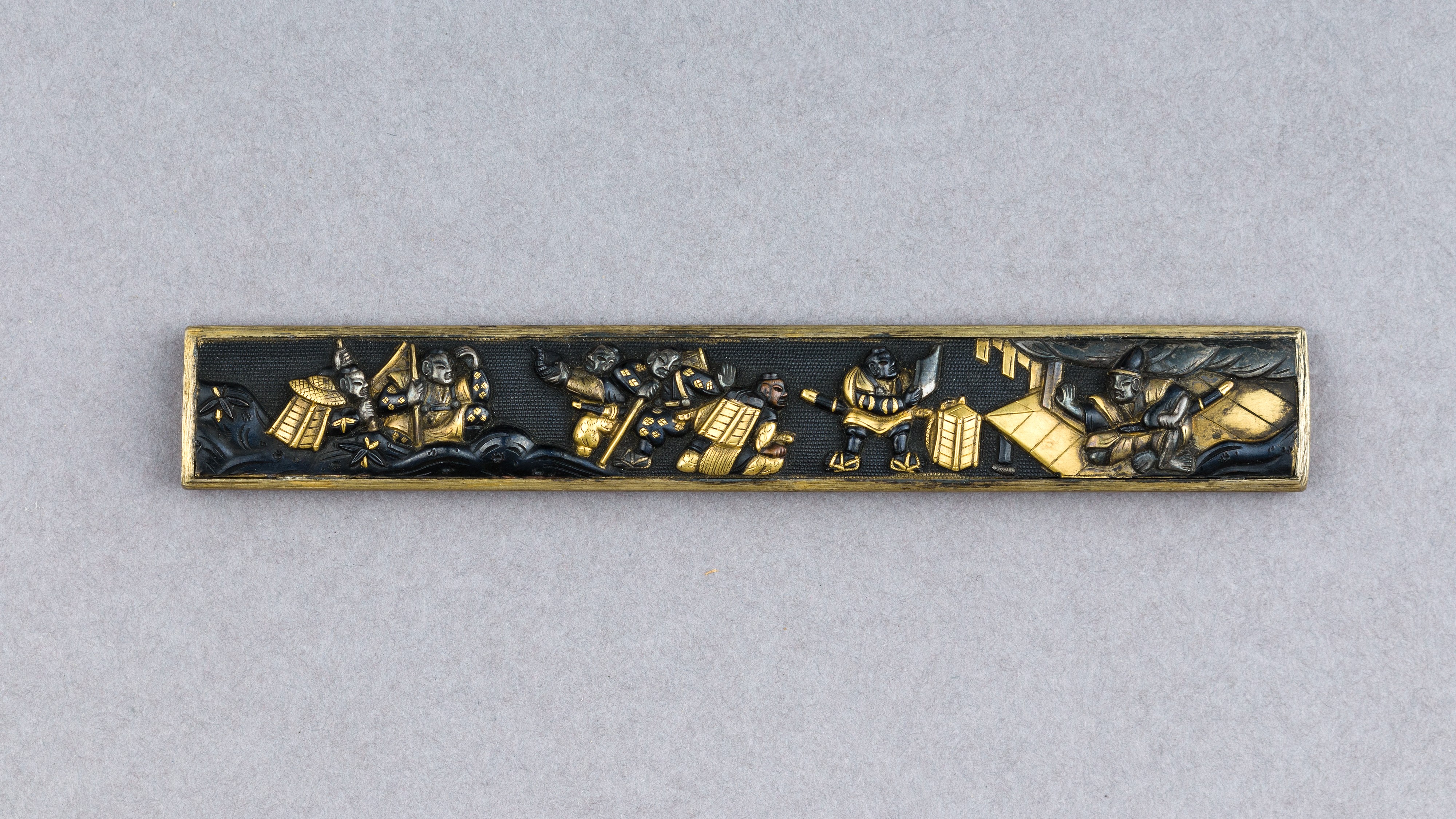 Japanese Sword Fitting with Warrior Carving