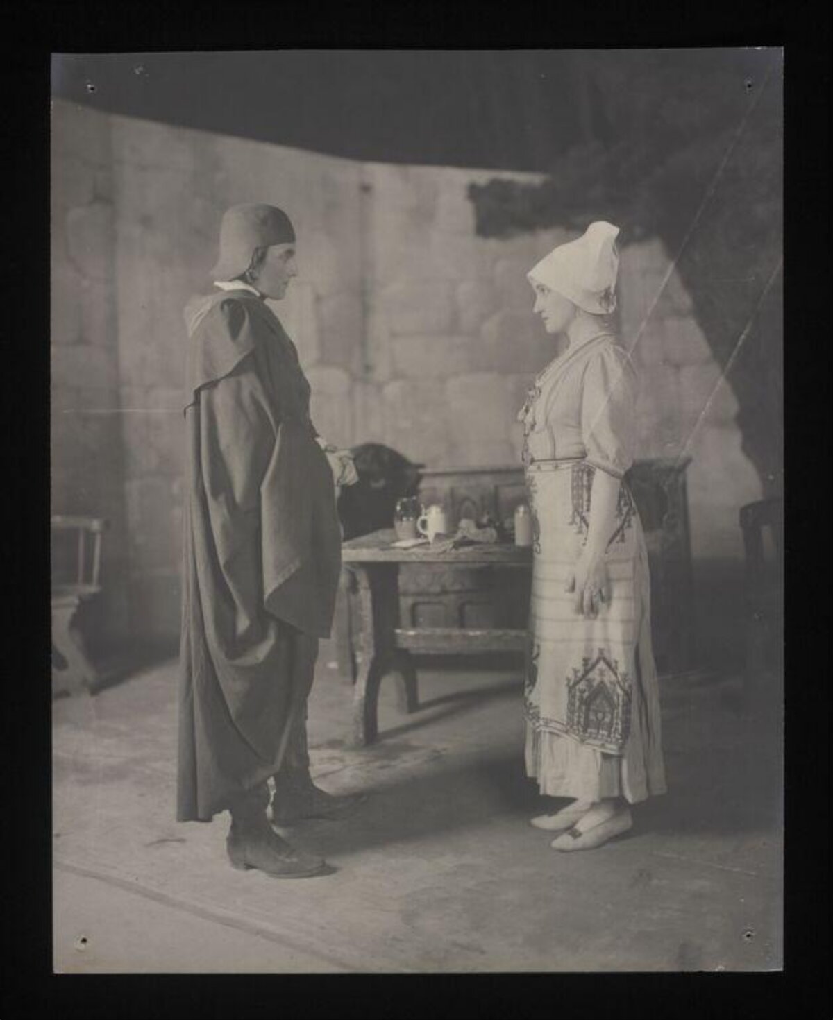 Two Period Costumed Actors on Stage