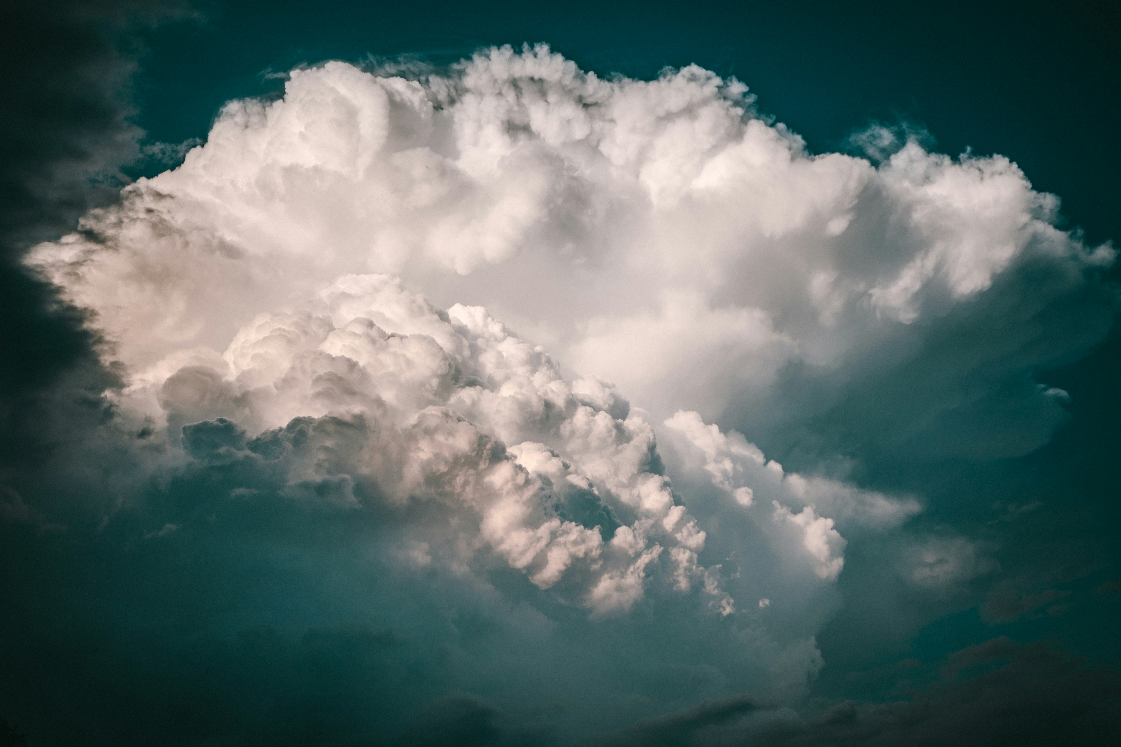 Massive Cumulus Cloud Against Dark Sky