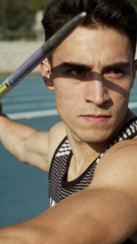 Athlete Preparing to Throw Javelin