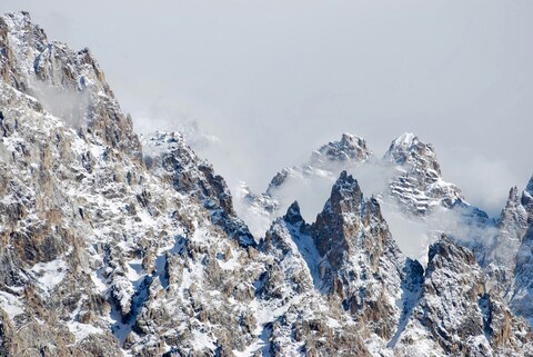 Snow-covered Jagged Mountain Peaks