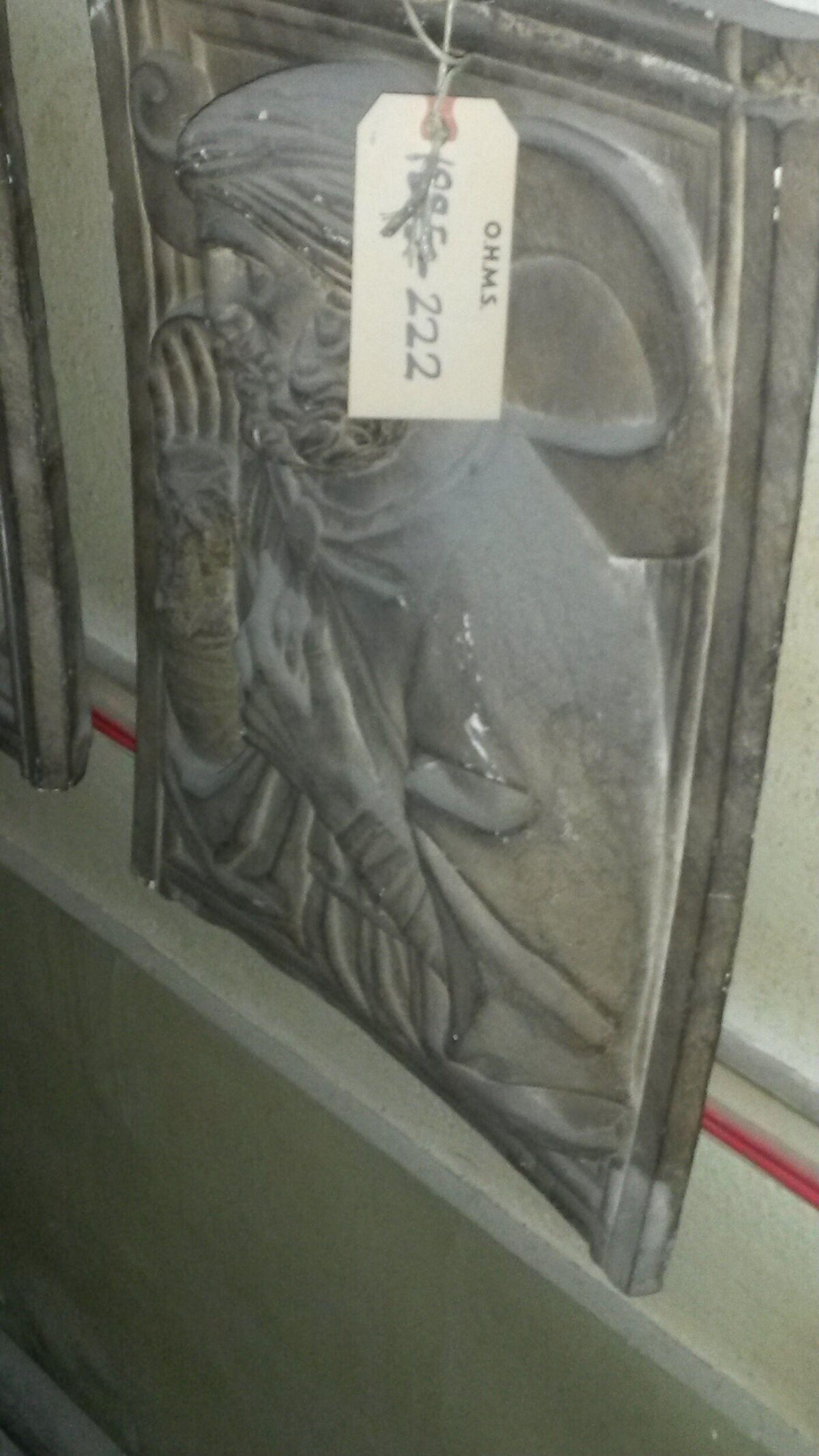 Tagged Relief Sculpture Artifact