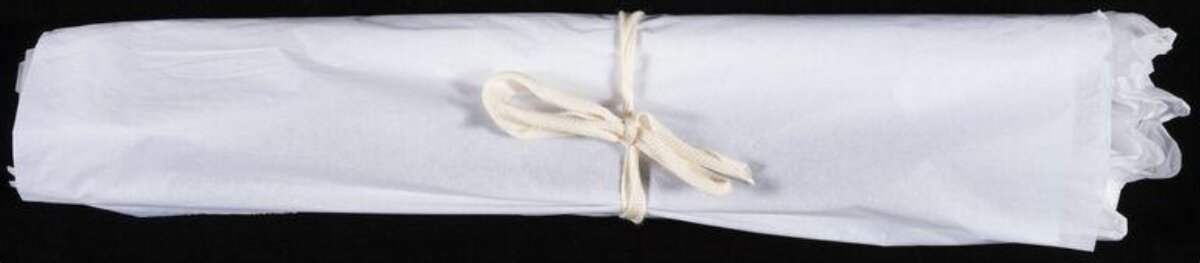 Rolled Tied White Bed Sheet