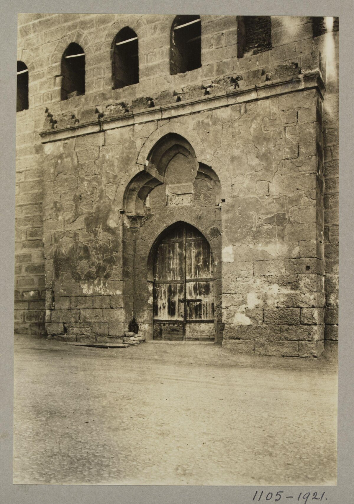 Vintage Arched Stone Gate Facade