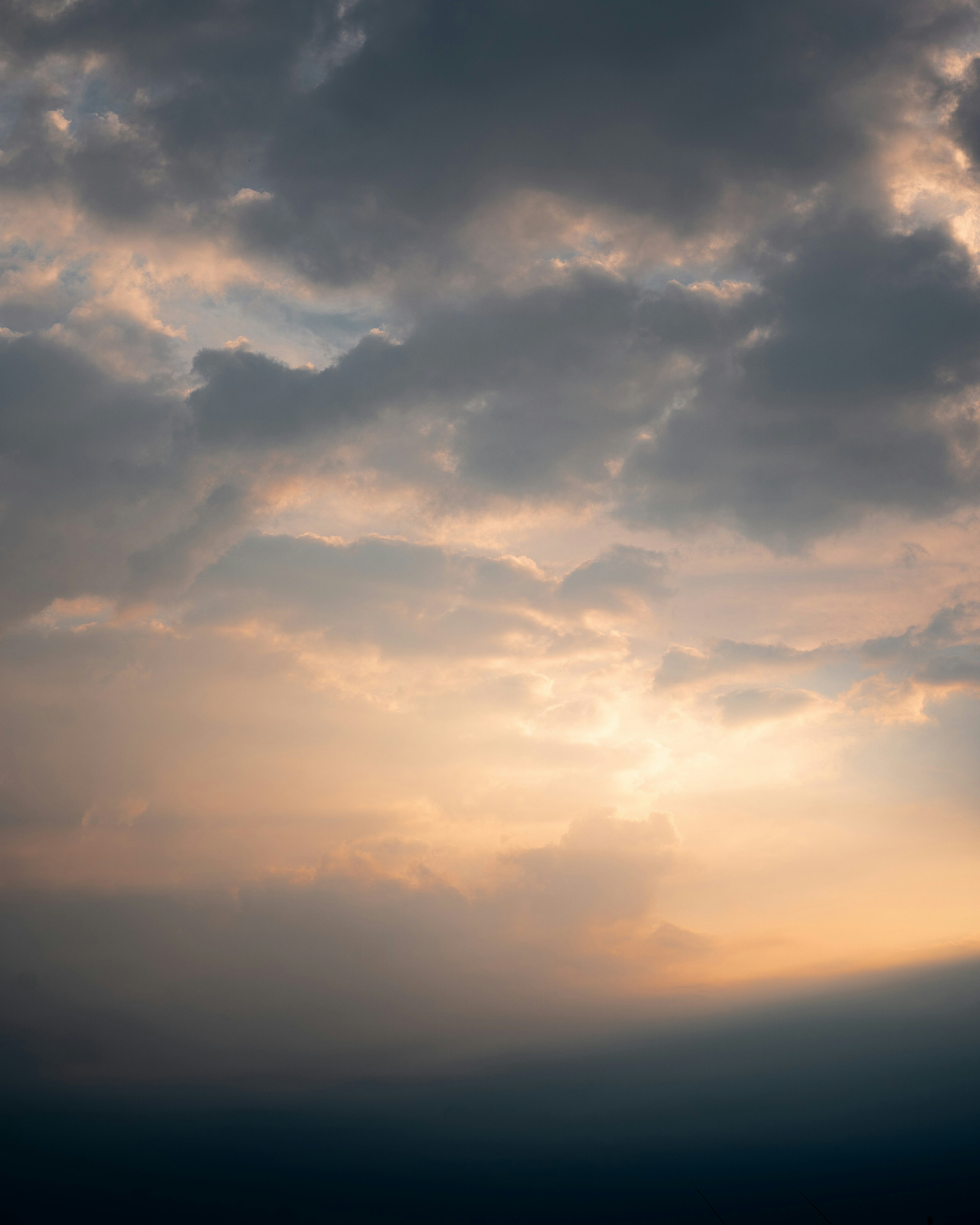Sunlit Cloudy Sky At Dusk
