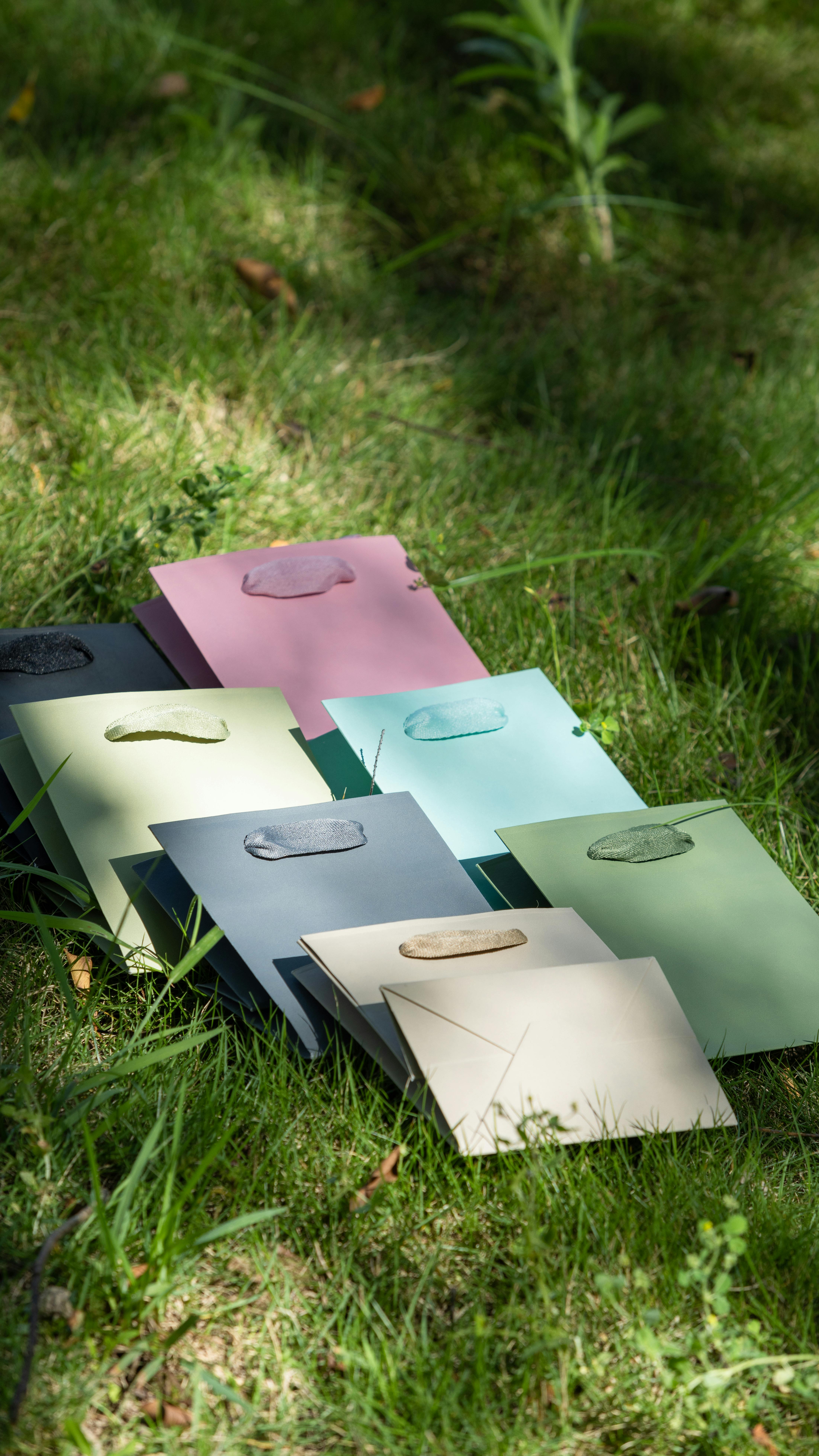 Colored Envelopes on Green Grass