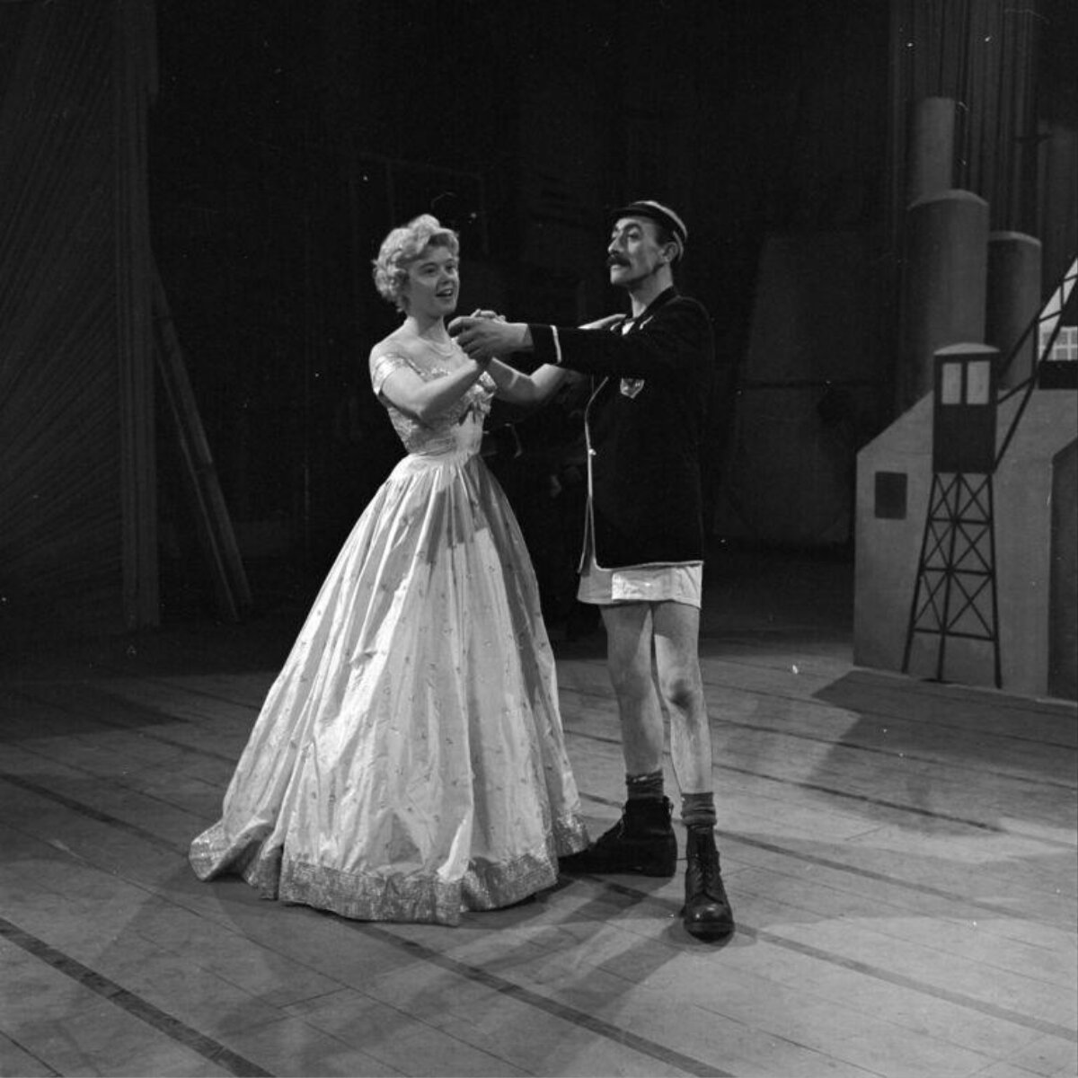 Two Actors Dancing on Stage