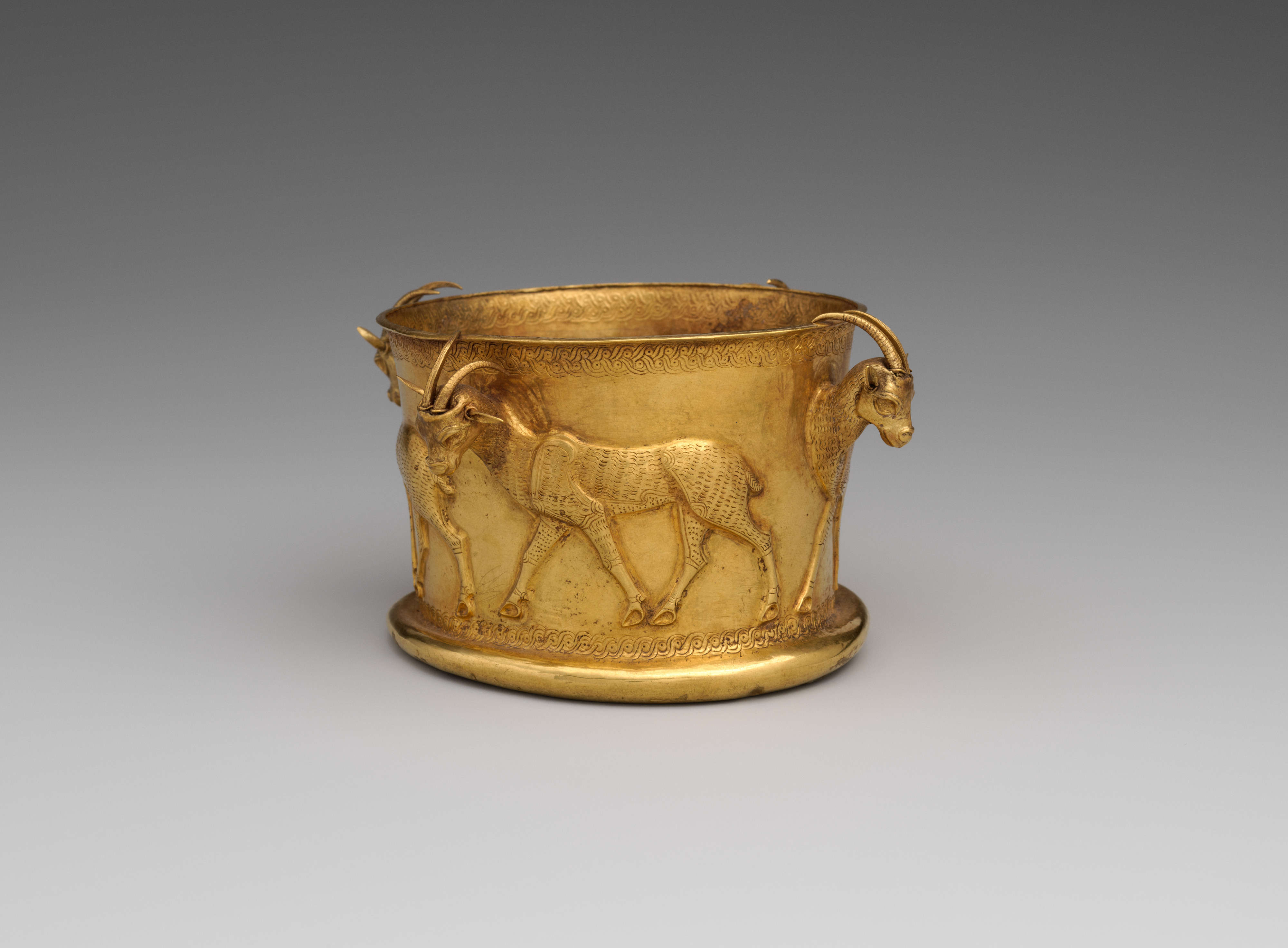 Ancient Golden Cup with Ibex Decorations