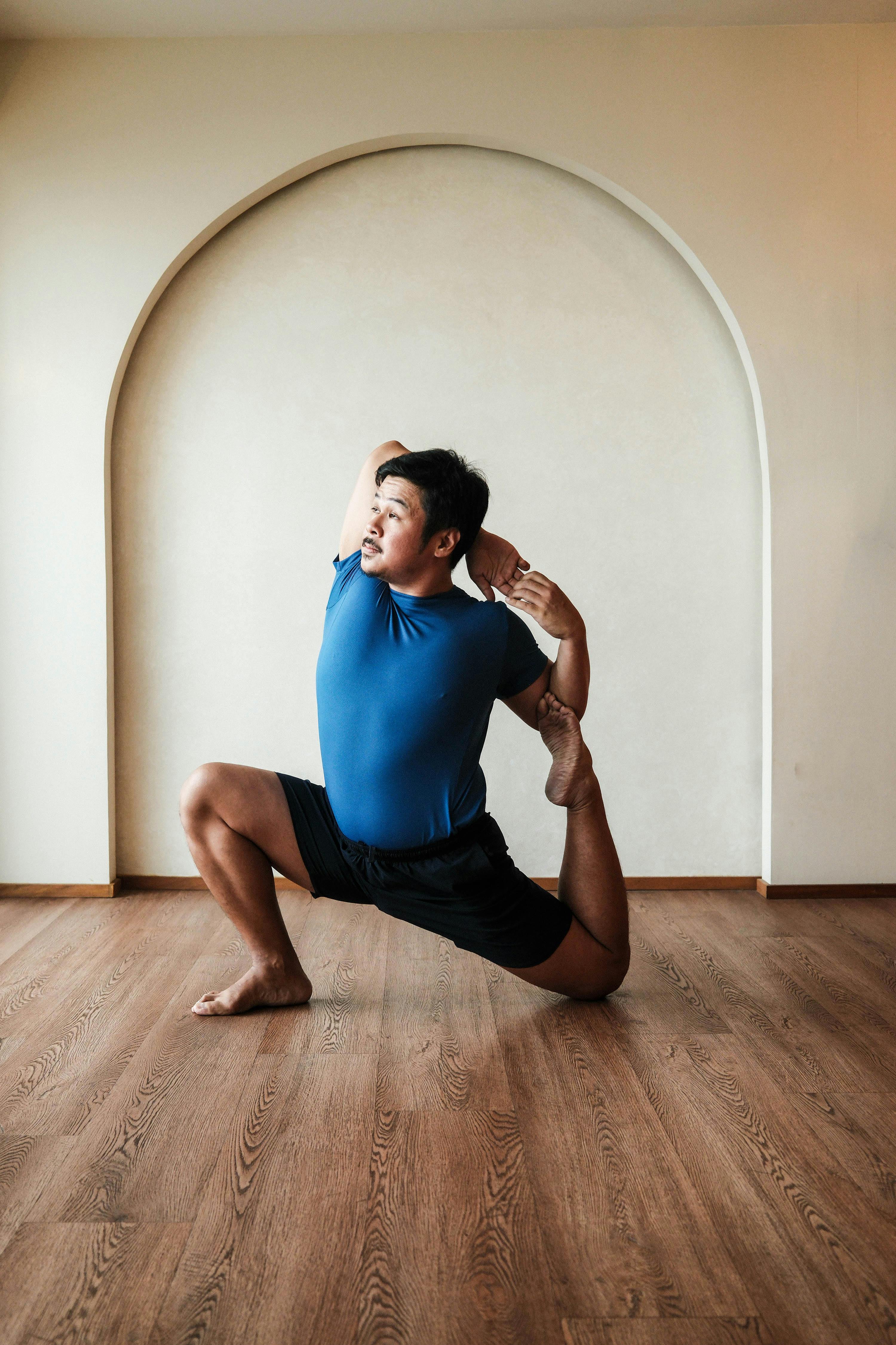 Man Practicing Yoga Pose