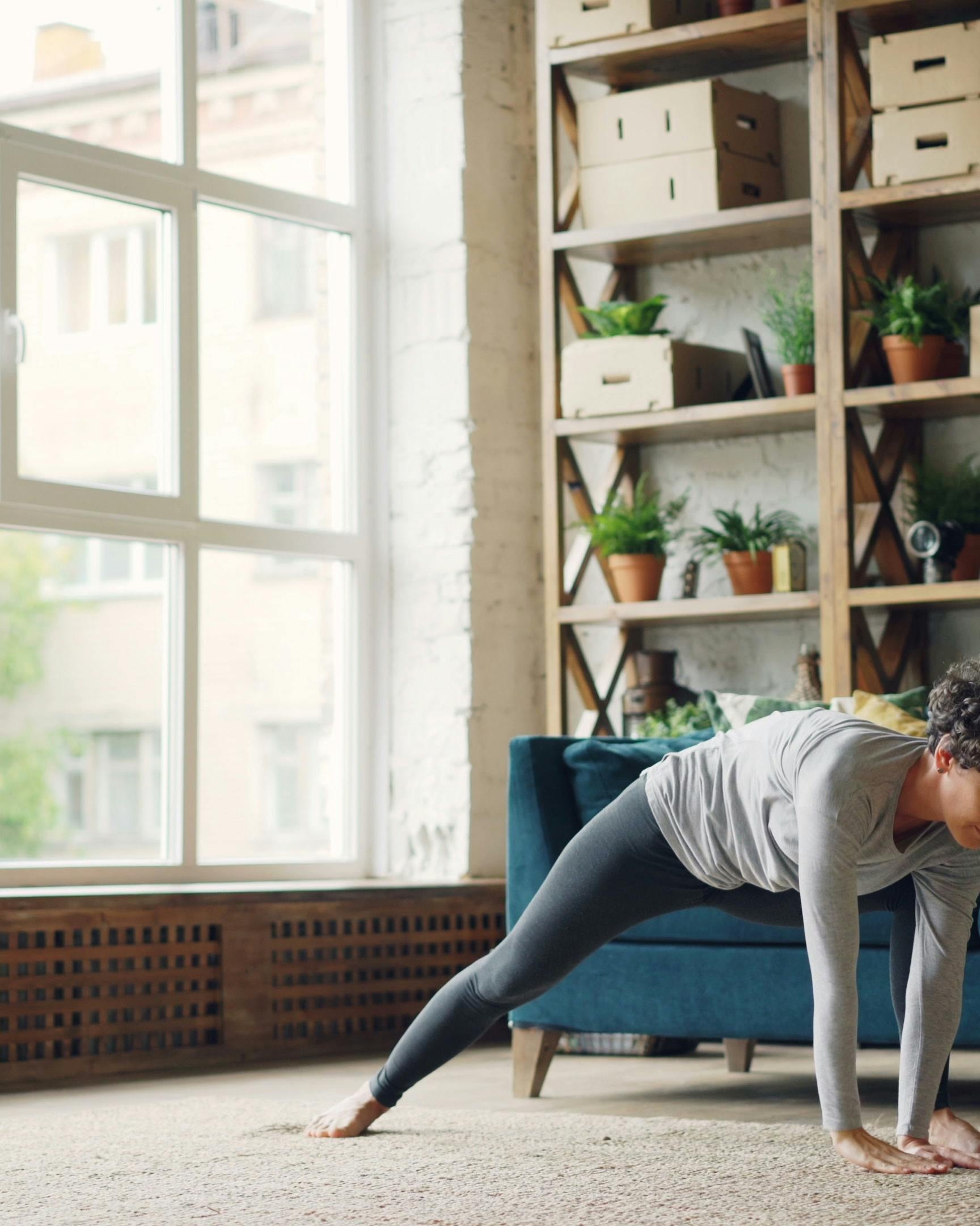 Woman Doing Yoga At Home