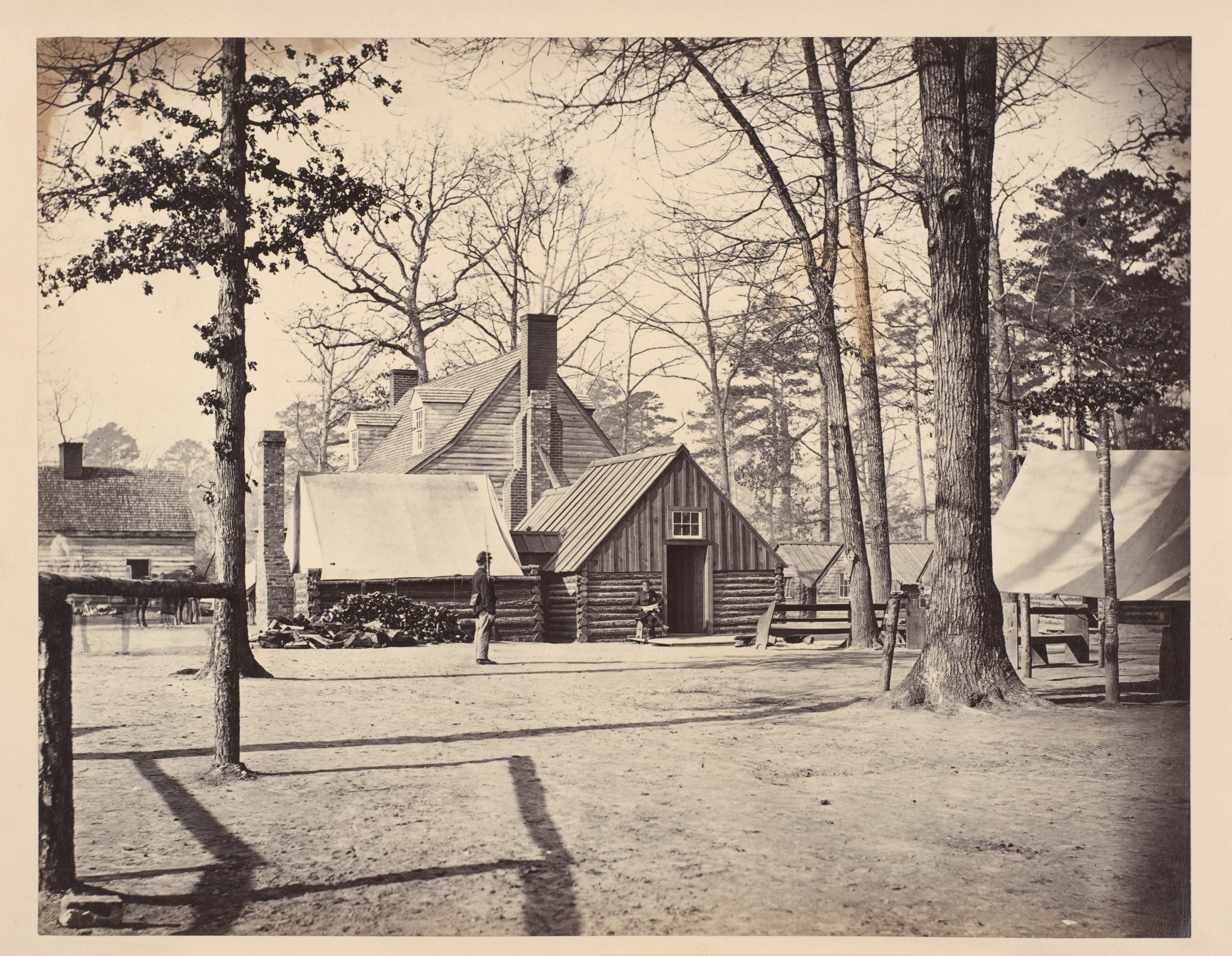 Old Log Camp in Wooded Clearing