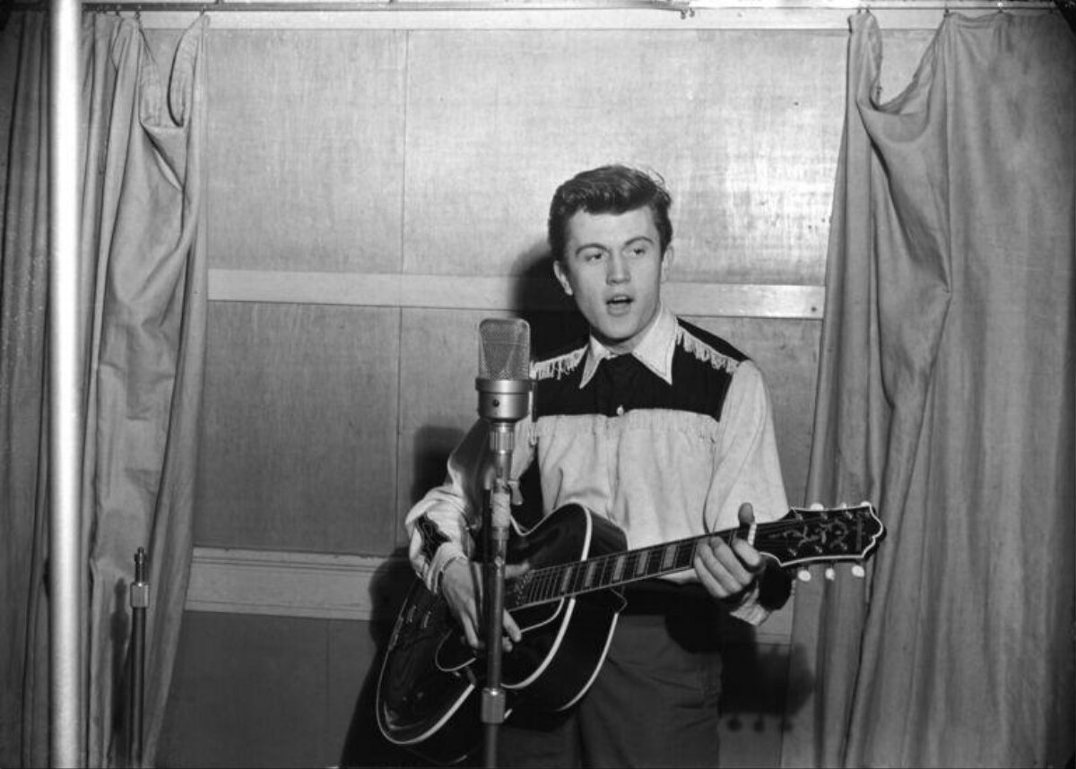 Young Musician Recording in Studio