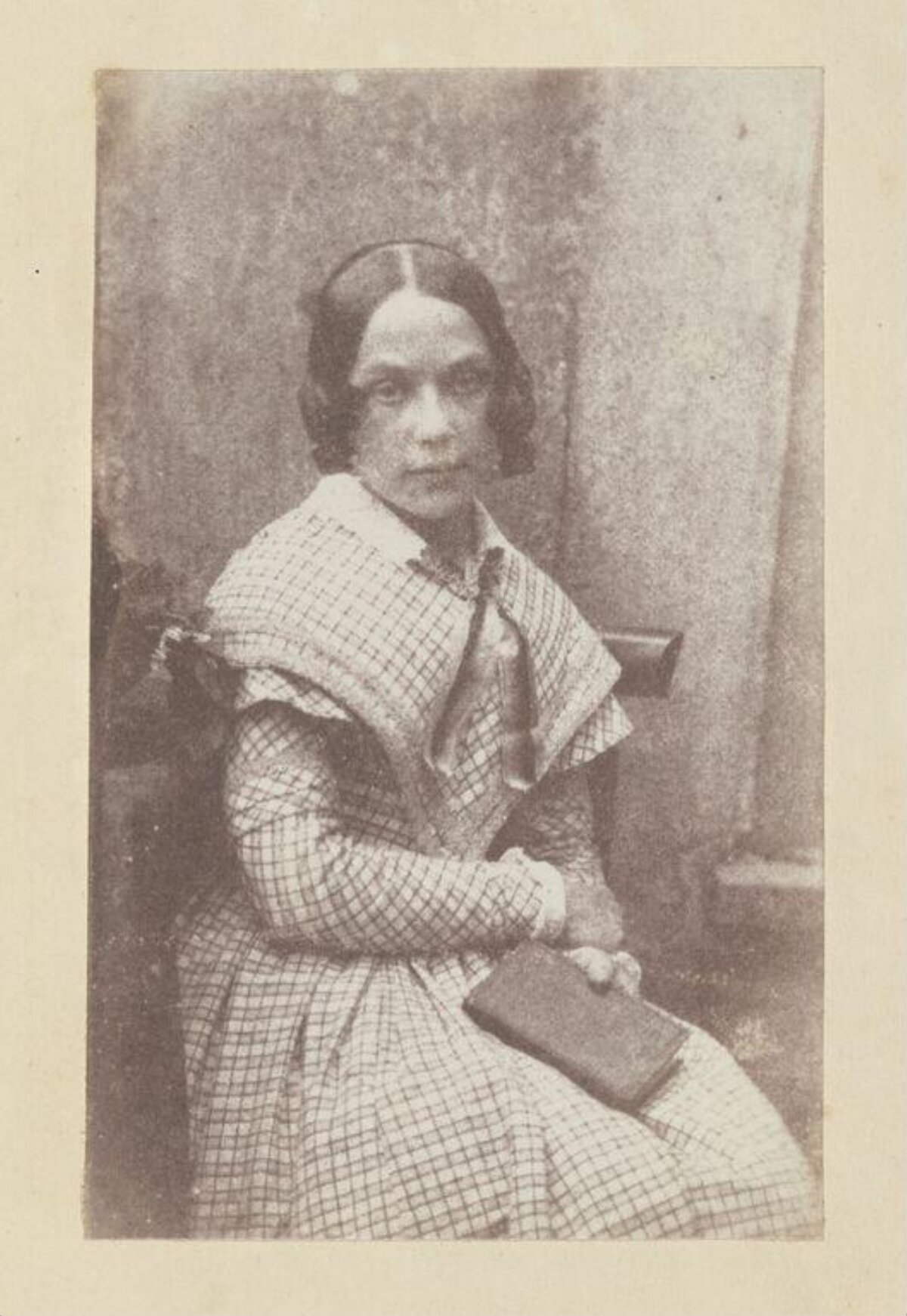 Vintage Portrait of Seated Woman with Book